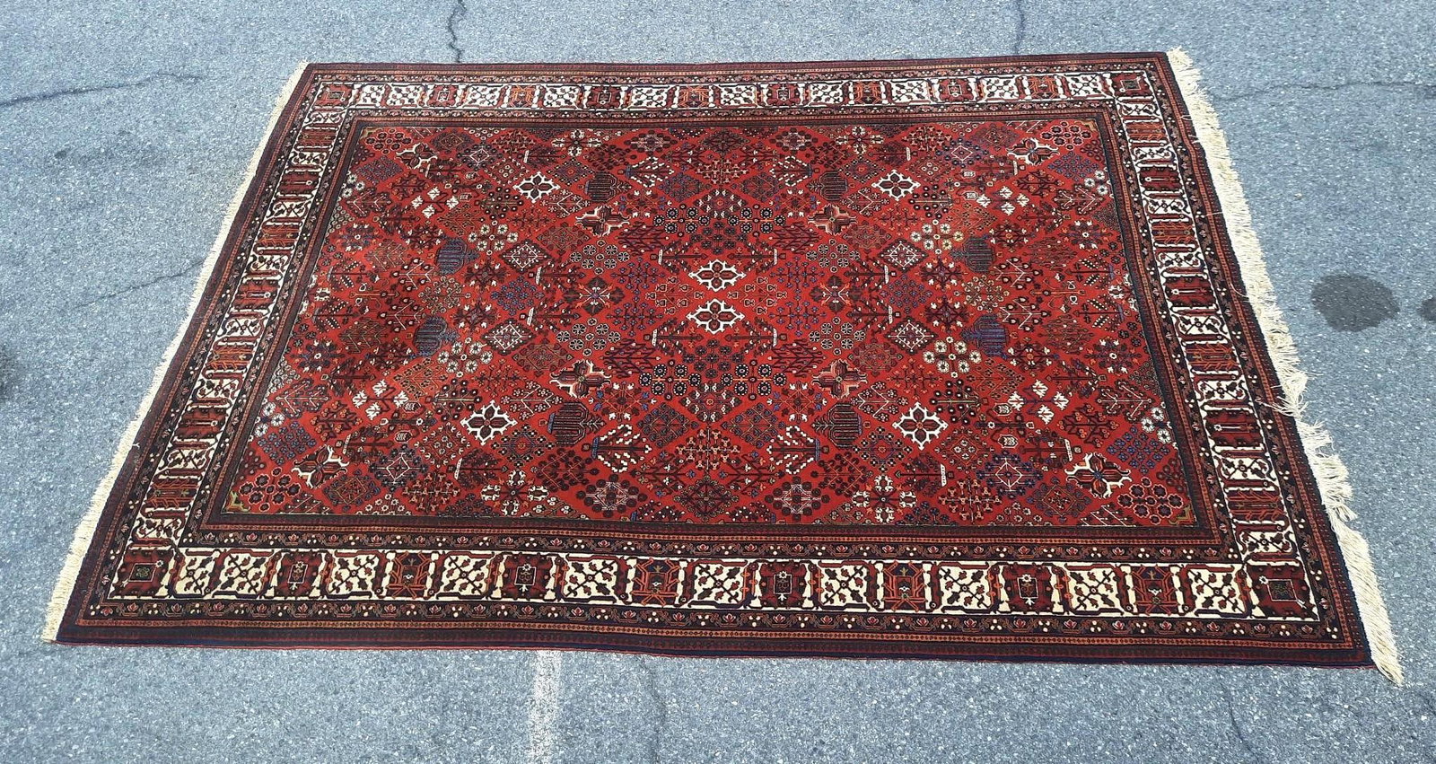 Room Size Mashad Persian Rug: NOT ELIGIBLE FOR IN-HOUSE SHIPPING. Central medallion with wide border. Hand knotted. Overall good condition. Mid-20th century. 10’ 8” x 12’ 6