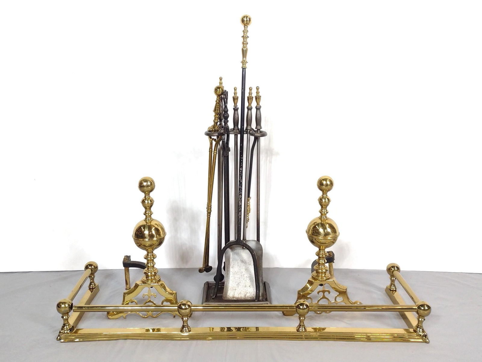 Fireplace Set: NOT ELIGIBLE FOR IN-HOUSE SHIPPING. 9" to 41" wide X 5" to 27-1/2" high. Fire fender is disconnected at one corner joint.