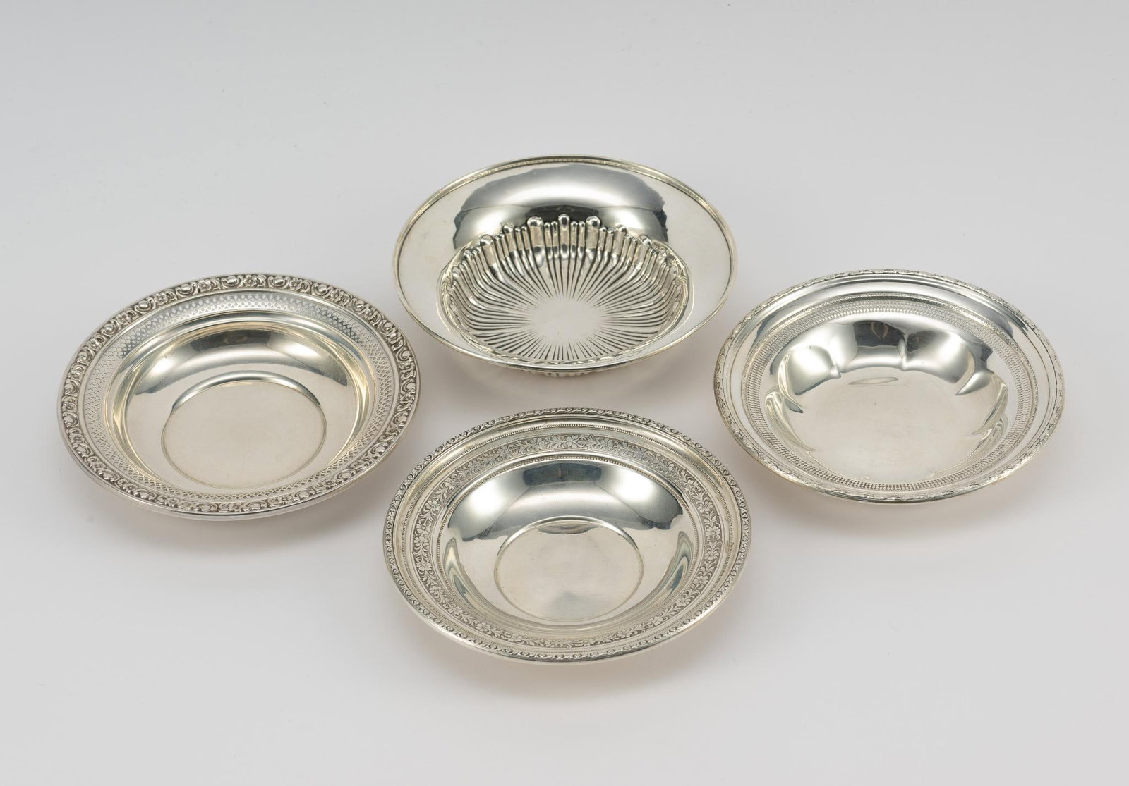 3 Sterling Silver Bowls: Includes Towle and Newport. 5-7/8" to 6" diameter x 1" to 1-1/2" high. 10.39 ozt total.