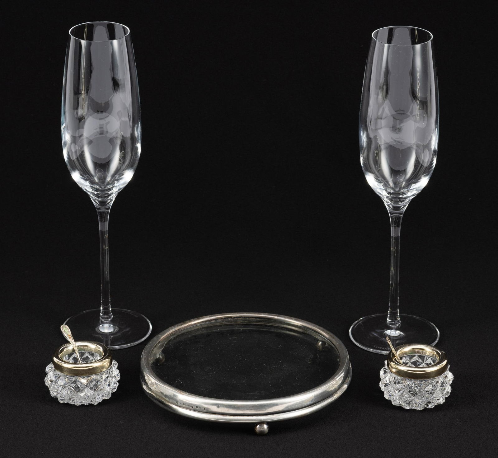 Tiffany & Co. Champagne Glasses; Silver & Cut Glass Salt Cellars; Sterling Rimmed Bottle Coaster (1 of 7)