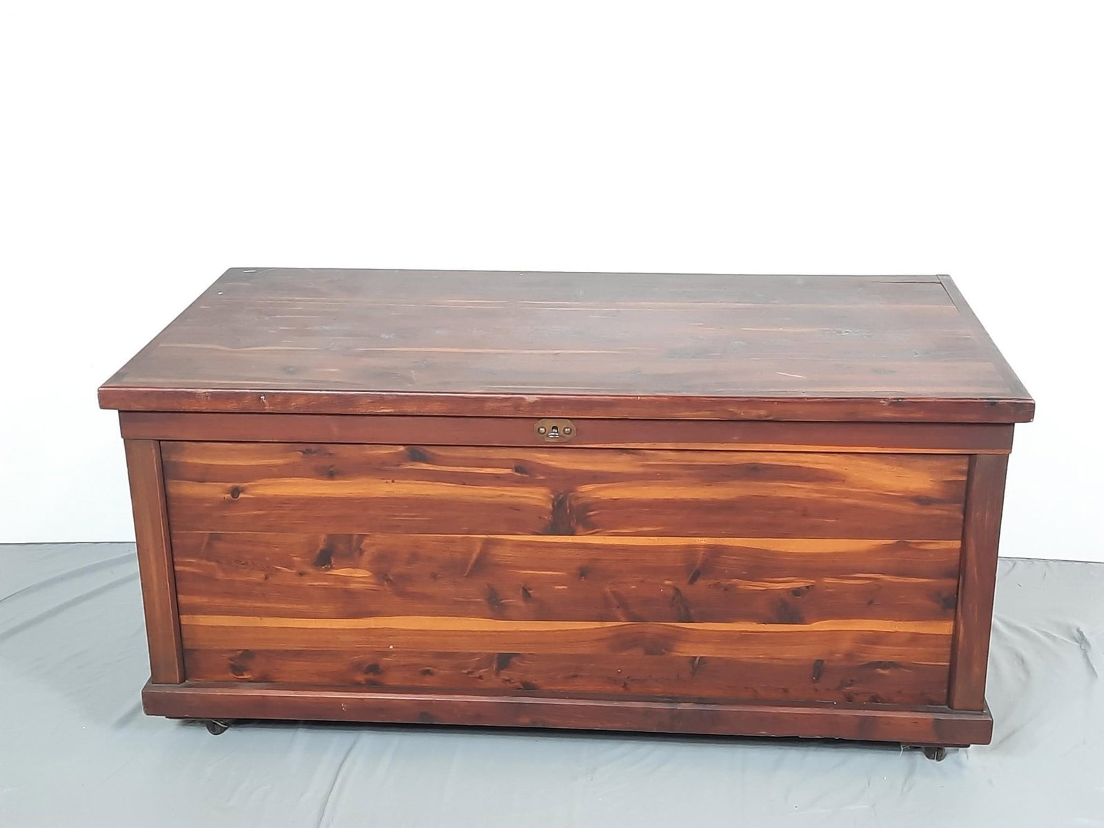 Blanket Chest: 48" wide x 24" deep x 22-1/2" high. Crack to top at back right. Some paint marks.