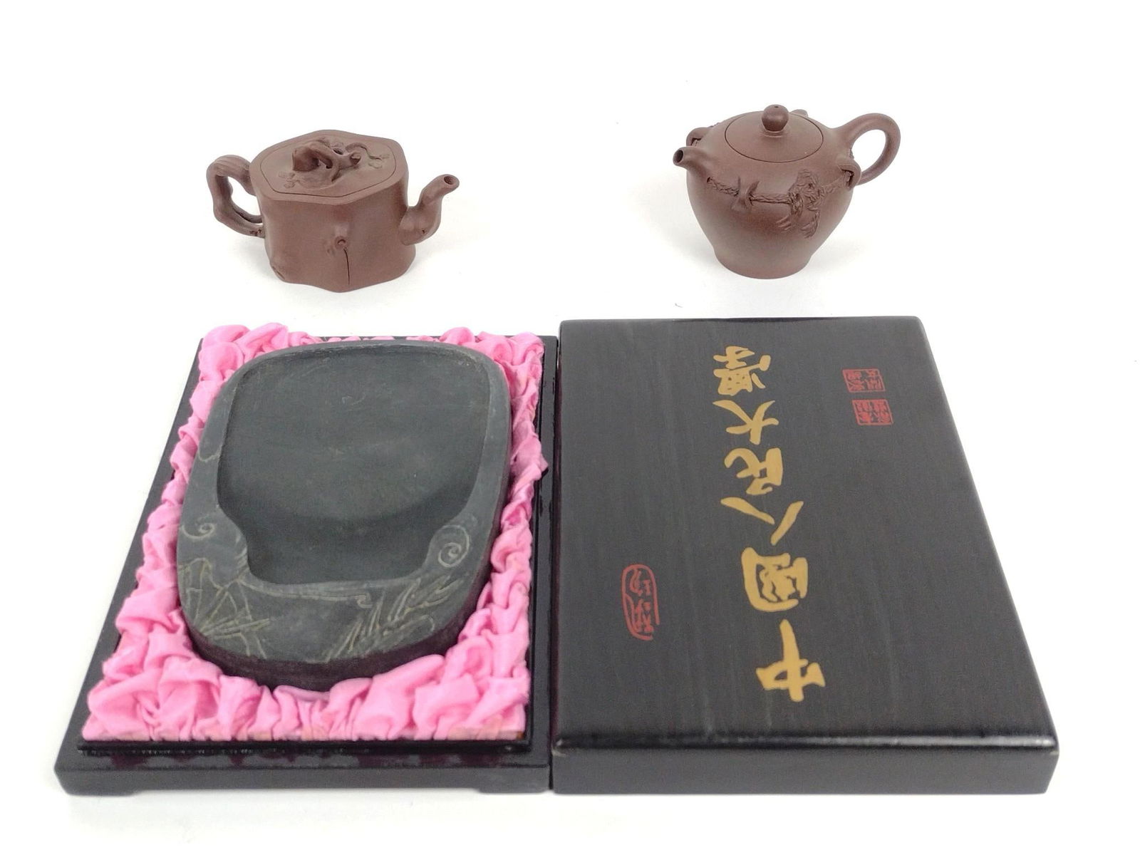 Calligraphy Ink Stone in OB and 2 Miniature Tea Pots: Pots each approximately 4" wide x 3-1/2" high. Ink stone: 6" x 4".