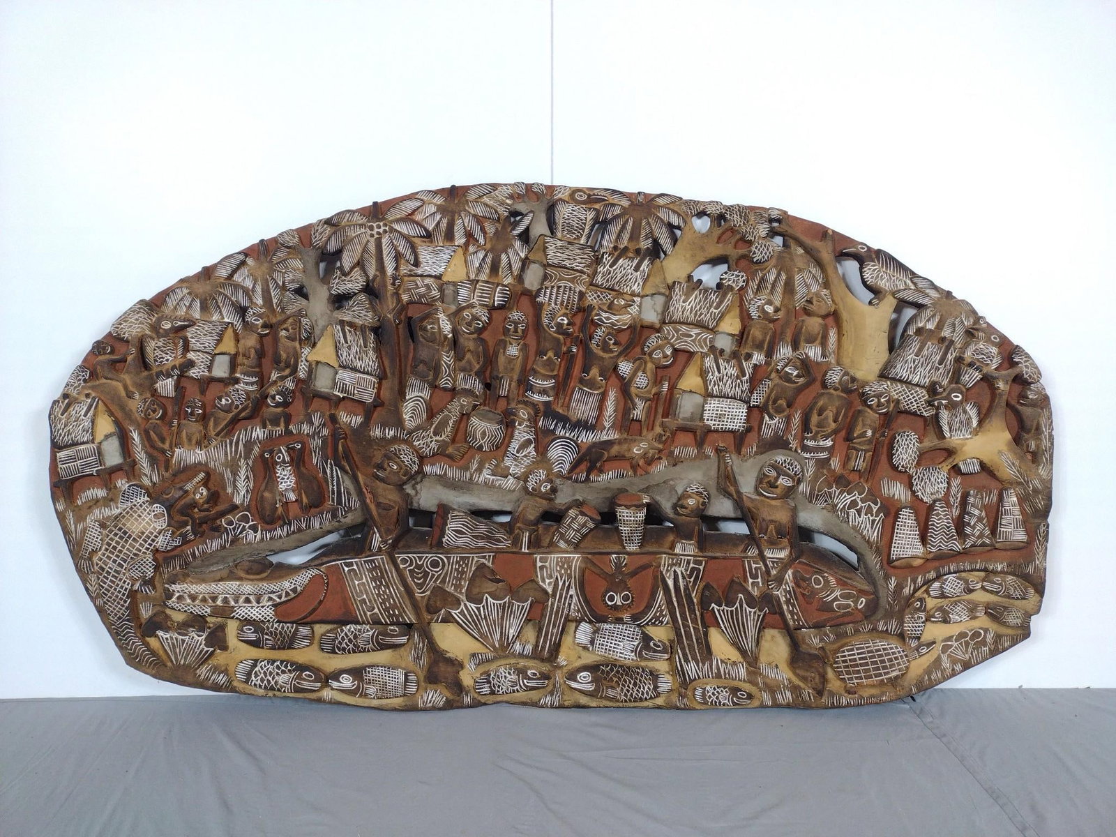 Figural Wood Carved Story Board: origin: Papa New Guinea. 64" wide X 1" deep X 35" high
