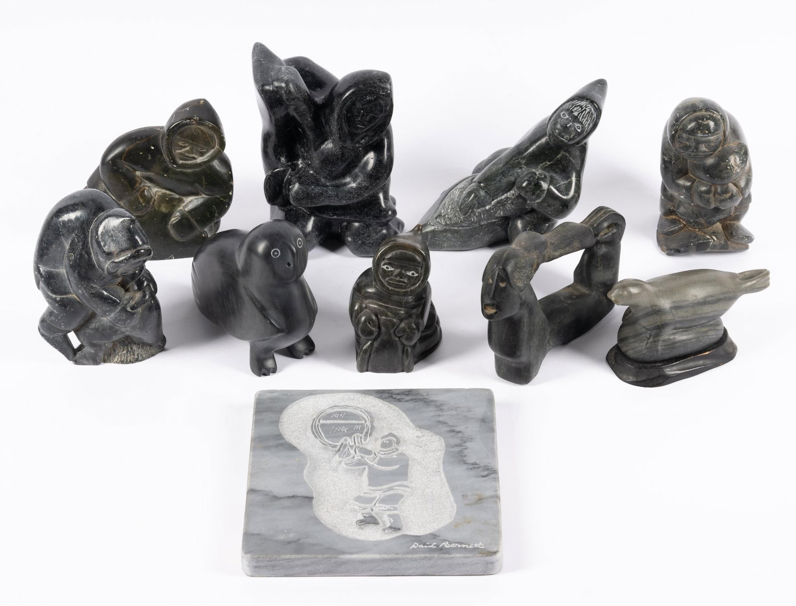 Ten Inuit Carved Stone Pieces: Many signed with sizes ranging from 5" to 7".