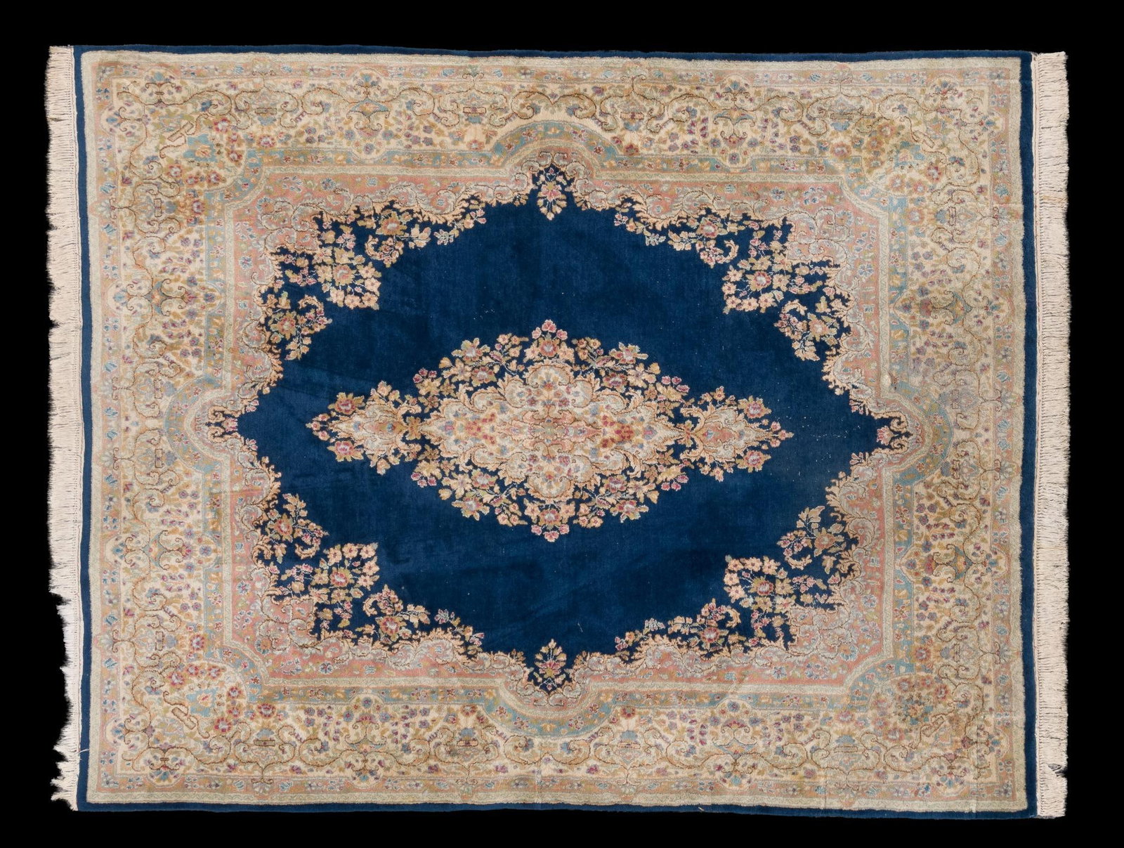 Persian Room Size Rug: NOT ELIGIBLE FOR IN-HOUSE SHIPPING. DESCRIPTION: Vibrant blue background with floral motif. MEASUREMENT: 7' 10" wide x 9' 11" long. CONDITION: Wear consistent with age and use.