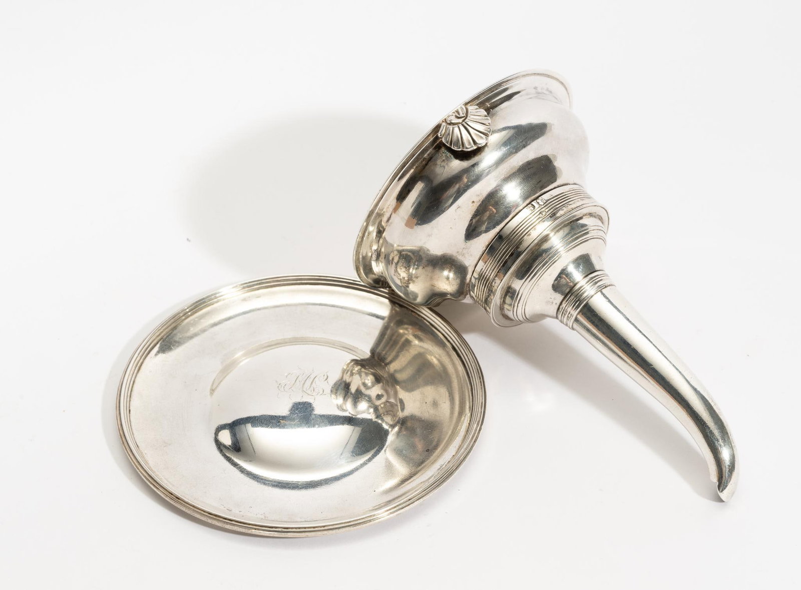 Antique English Sterling Silver Wine Funnel and Dish: DESCRIPTION: The funnel is lacking a strainer. Additionally the stamping of the dish indicates a different silversmith than the stamping of the funnel. MEASUREMENT: 5" high and 5 ozt total.