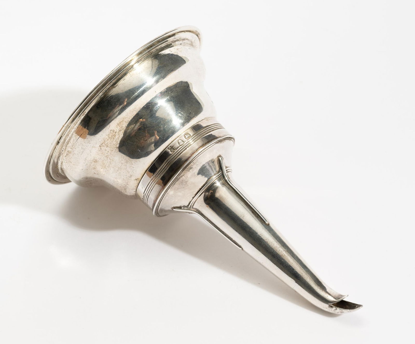 Antique English Sterling Silver Wine Funnel: DESCRIPTION: The funnel is two piece construction. MEASUREMENT: 5" high and 3.1 ozt total.