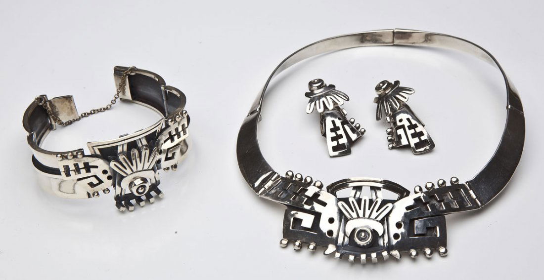 Mexican Sterling Necklace, Earrings, Bracelet Set: DESCRIPTION: Mexican sterling set comprising a necklace, screw-back earrings and bracelet of modernist form. Each piece marked "Mexican 925 VOO" with eagle for 1975. Necklace also with inscription "To