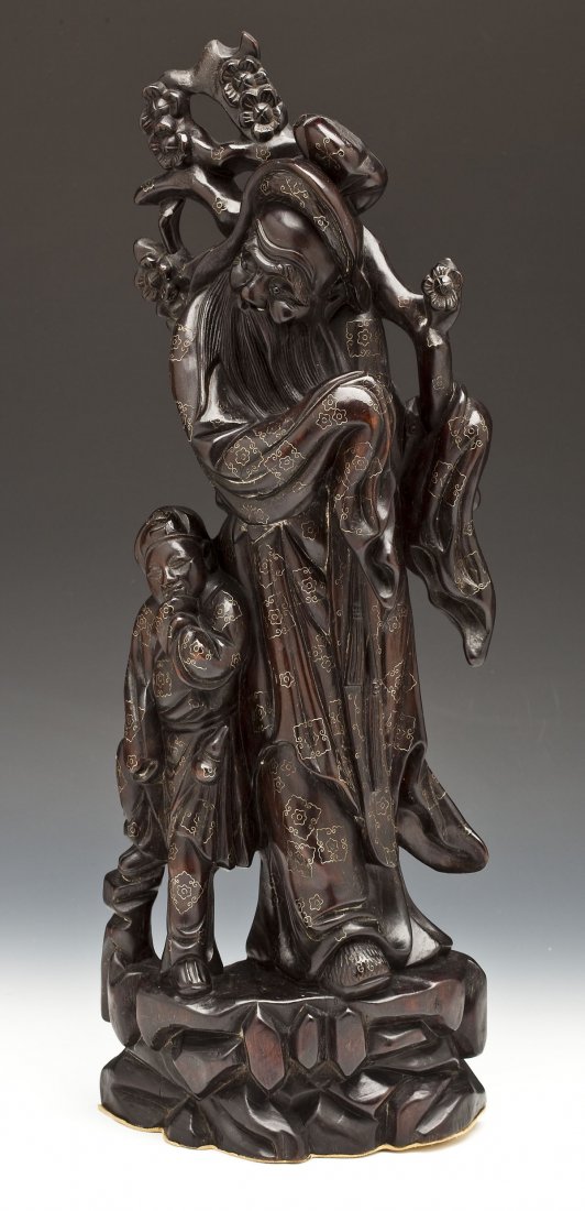 Chinese Inlaid & Carved Wood Figure: DESCRIPTION: Chinese carved wood figure with decorative brass wire inlay throughout. Depicts a man with a long beard and a boy standing. MEASUREMENTS: 20-3/4" high. CONDITION: Repair to upper left vin