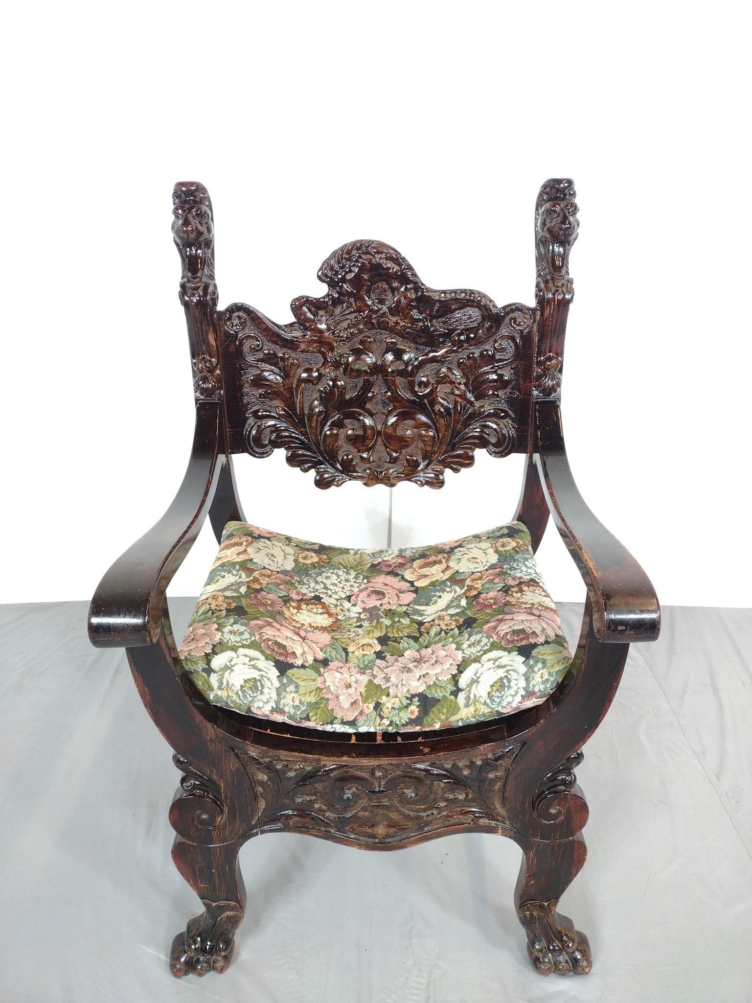 Carved Lion Savonarola Chair: NOT ELIGIBLE FOR IN-HOUSE SHIPPING. 24-1/4" wide X 22" deep X 42" high. Has some scratches and finish loss.
