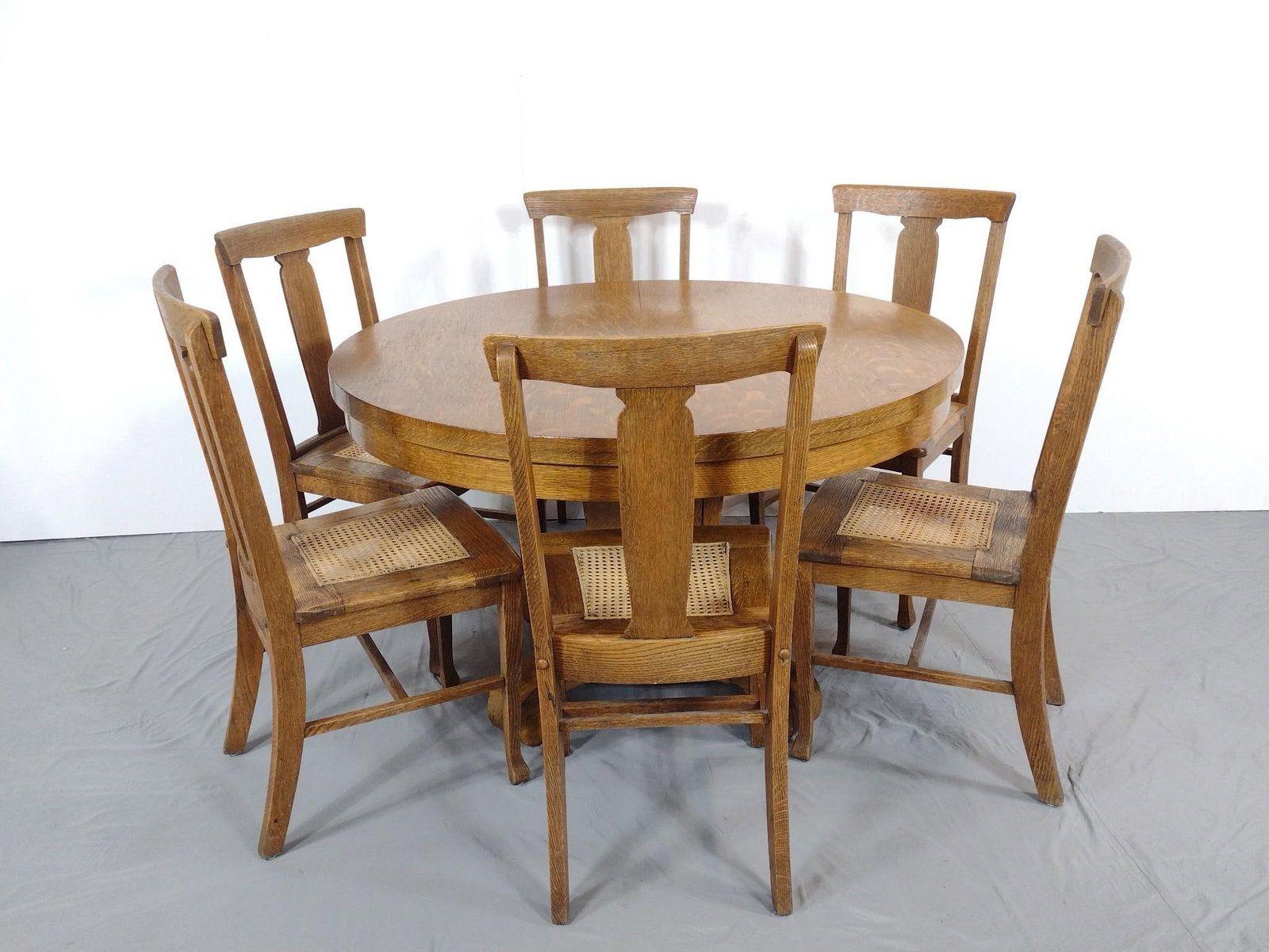 Round Table With 6 Chairs: NOT ELIGIBLE FOR IN-HOUSE SHIPPING. Table 48" diameter X 29" high. Chairs 18" wide X 17" deep X 37" high. All pieces have some scratches.