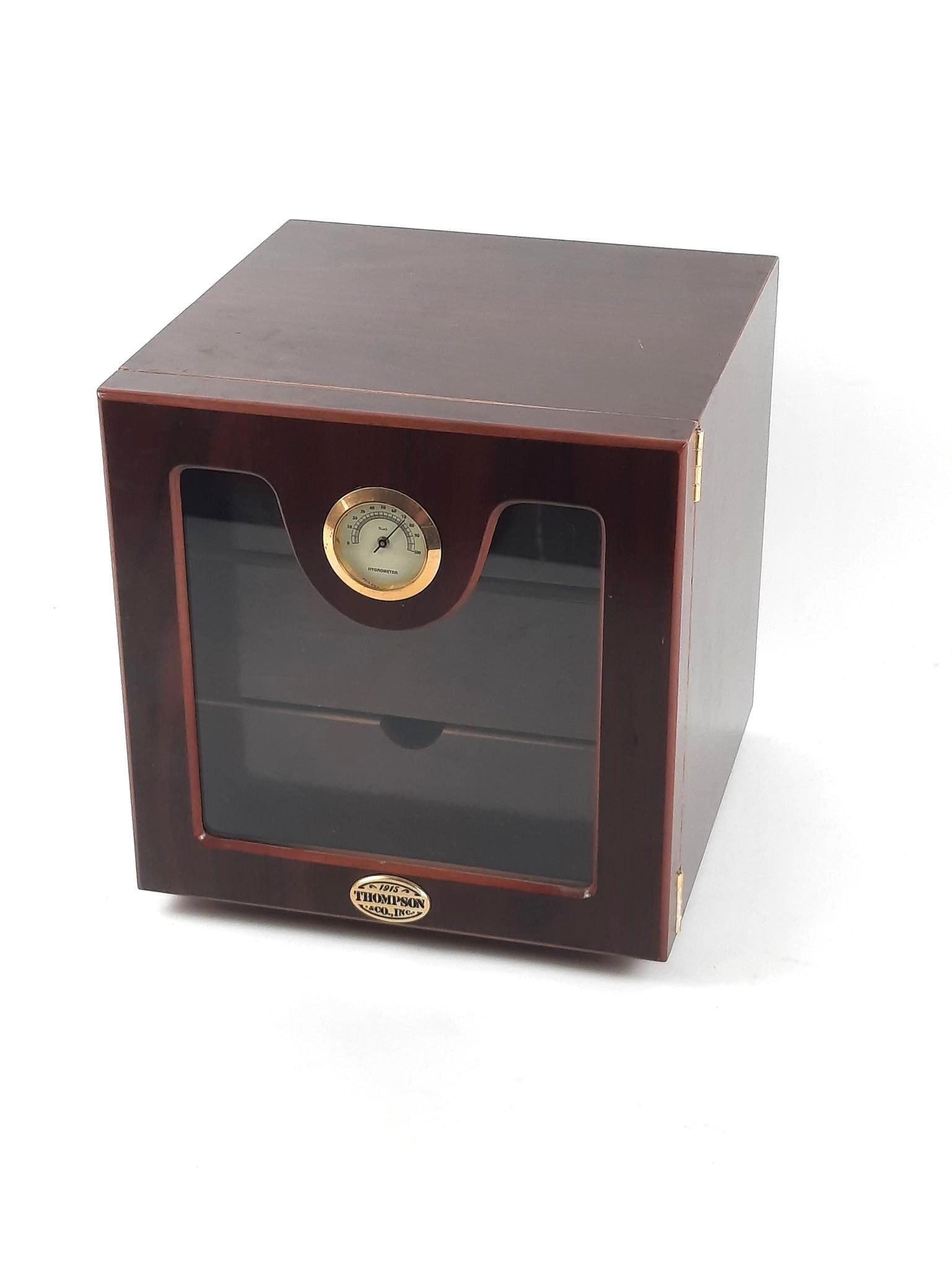 Thompson & Co. Vintage Humidor: NOT ELIGIBLE FOR IN-HOUSE SHIPPING. Dry cigars inside. 9-3/4" wide x 9-3/4" deep x 10" high.