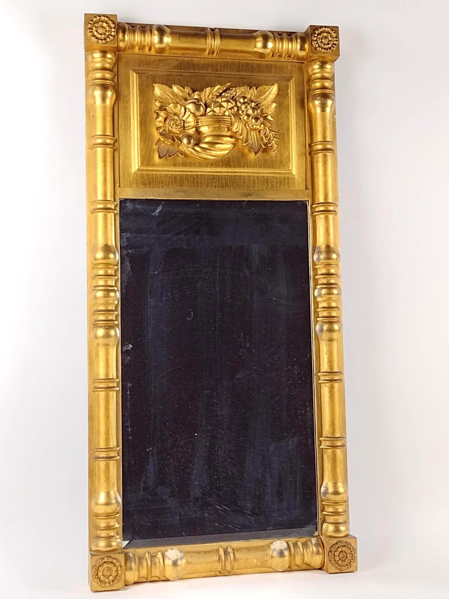 Antique Gilt Mirror with Florets: NOT ELIGIBLE FOR IN-HOUSE SHIPPING. Overall with frame: 35-1/2" high x 16-1/2" wide. Some silvering to mirror and wear to frame.