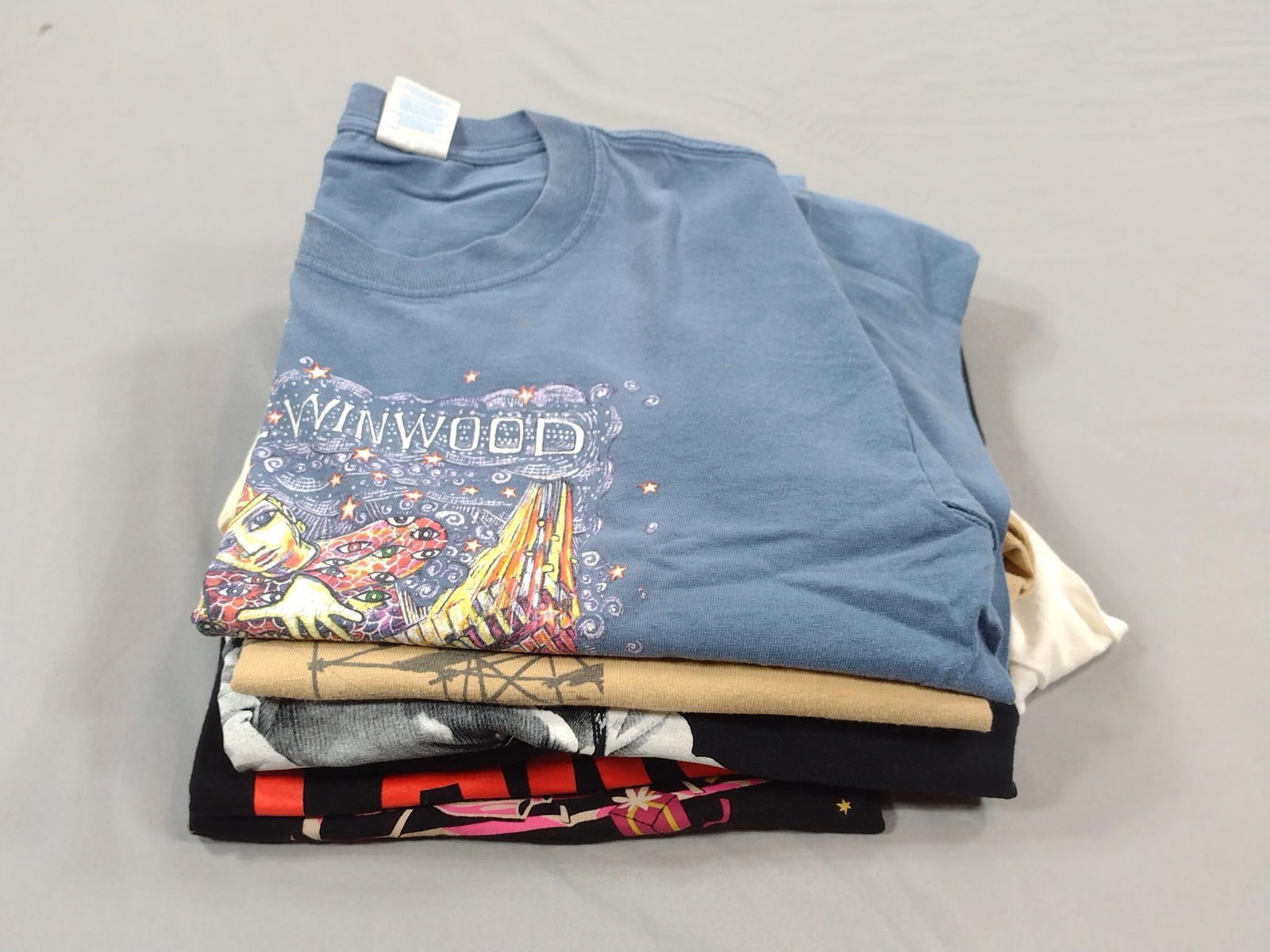 8 Concert T-Shirts: Includes Steve Winwood. Sizes Medium and Large.