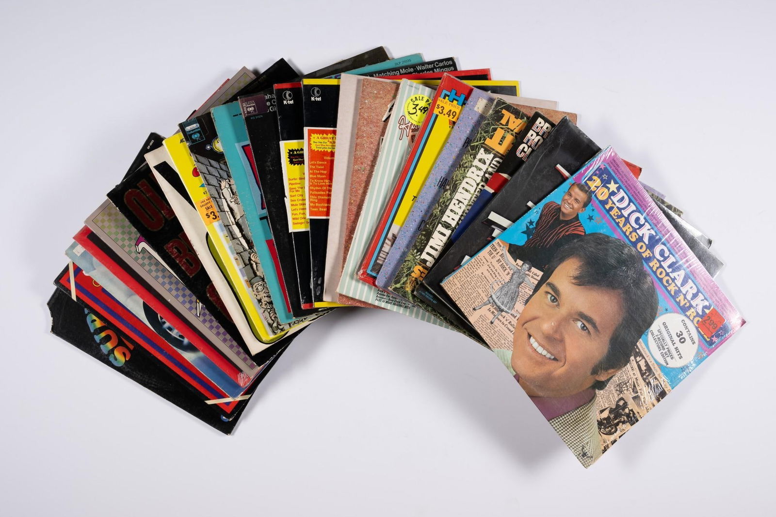 23 Hottest Hits / Compilation Records: Includes MTV's Rock N' Roll To Go, Dick Clark's 20 Years of Rock N' Roll, and more. NOTICE: Records have not been reviewed outside of covers. Some wear and residue to covers due to storage.