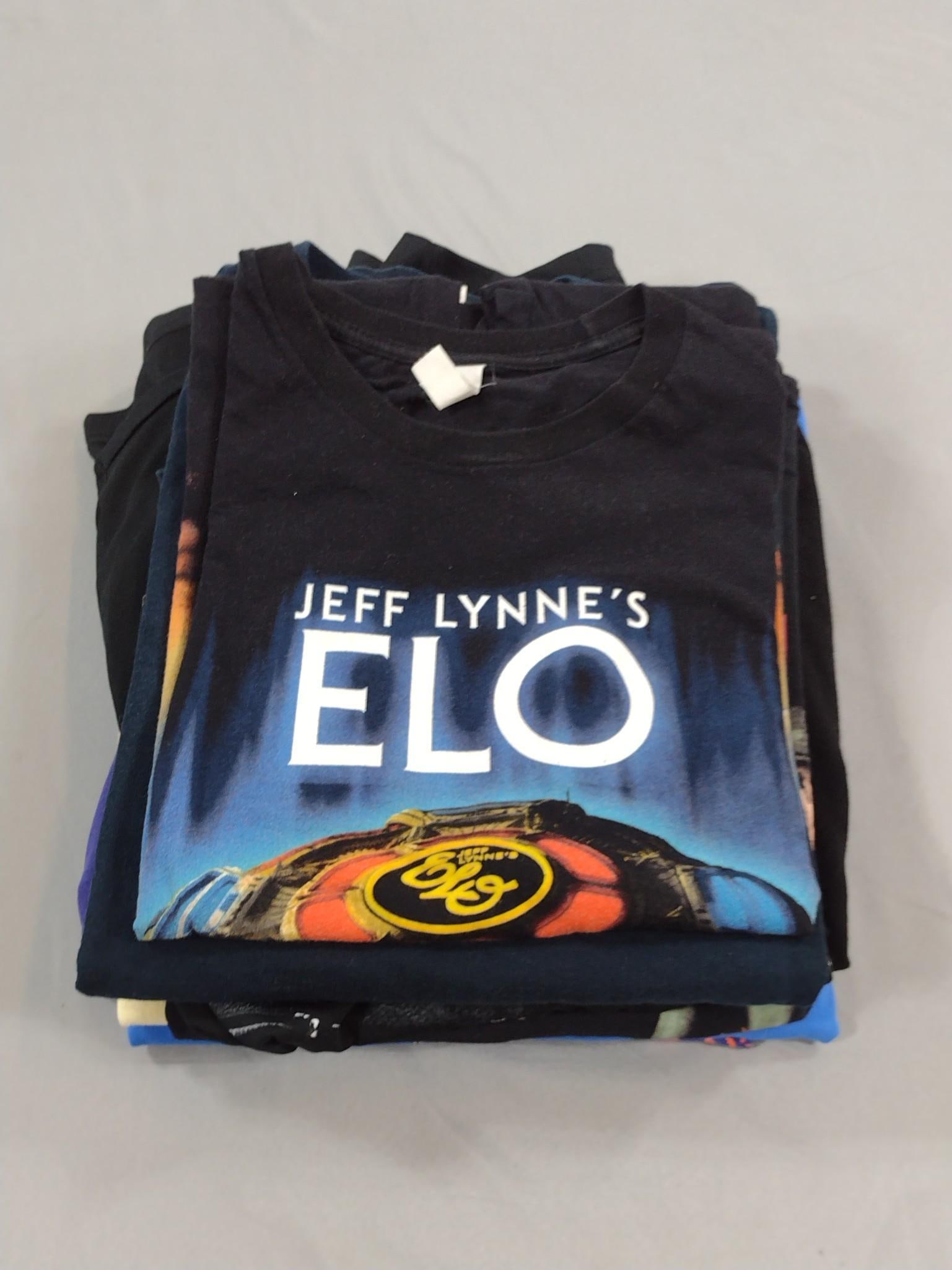 8 Concert T-Shirts: Includes Moody Blues and Phil Collins. Sizes Medium to Large.