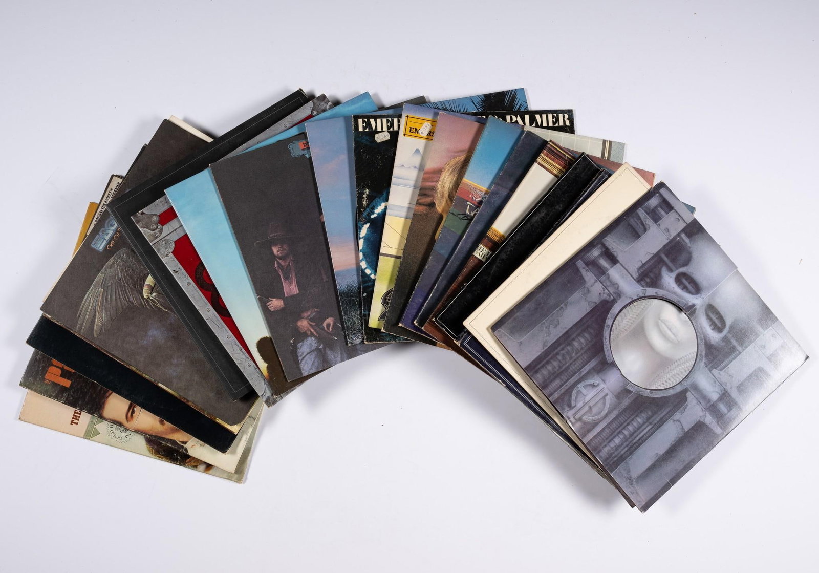 21 Records incl Emerson, Lake and Palmer: Also includes The Eagles and The Mama's & The Papa's. NOTICE: Records have not been reviewed outside of covers. Some wear and residue to covers due to storage.