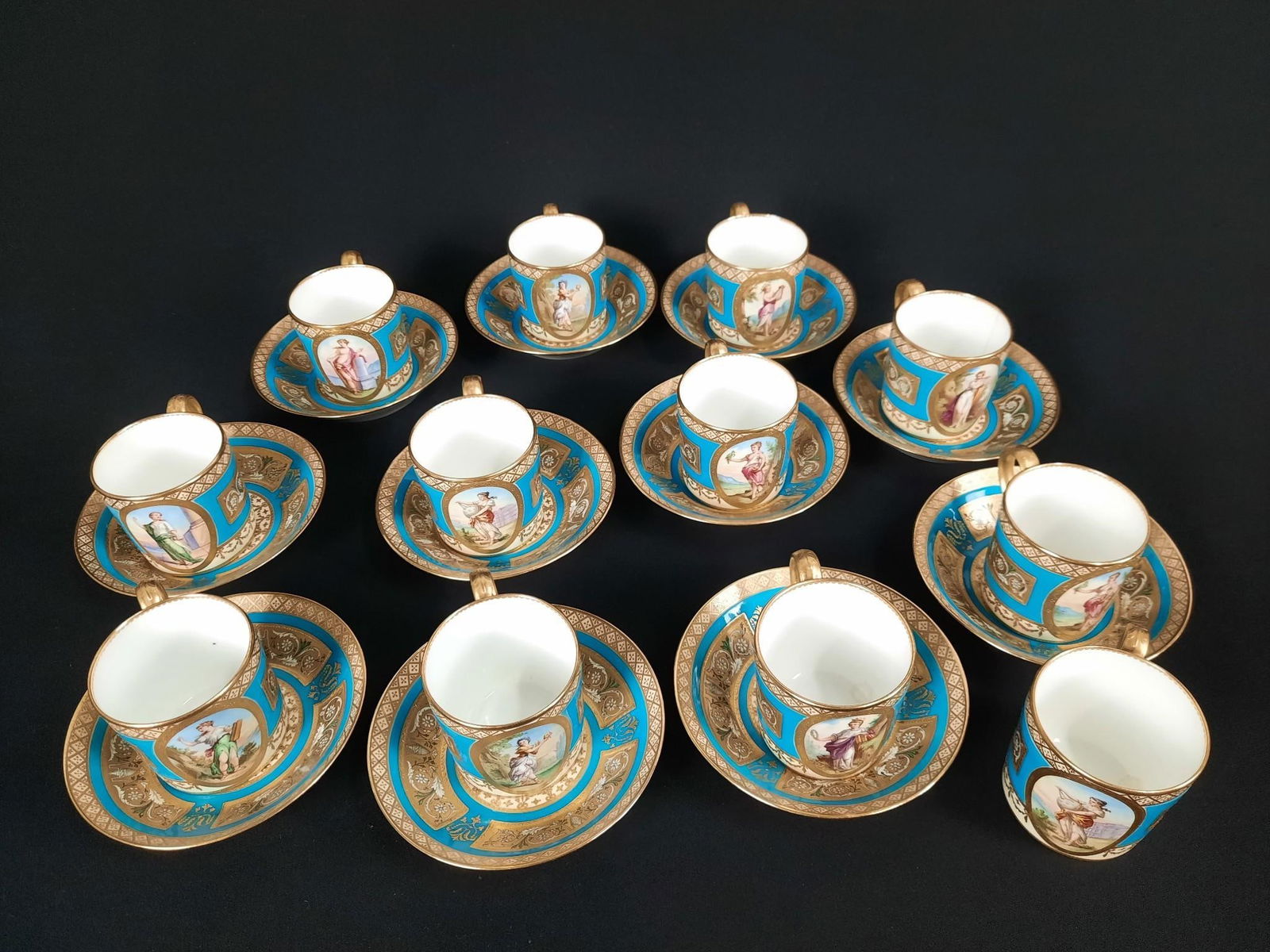 23 Pc Minton Portrait Cups and Saucers: Saucers: 5" diameter. Cups: 2-1/2" high. One cup with chip to top rim. One cup with old crack.