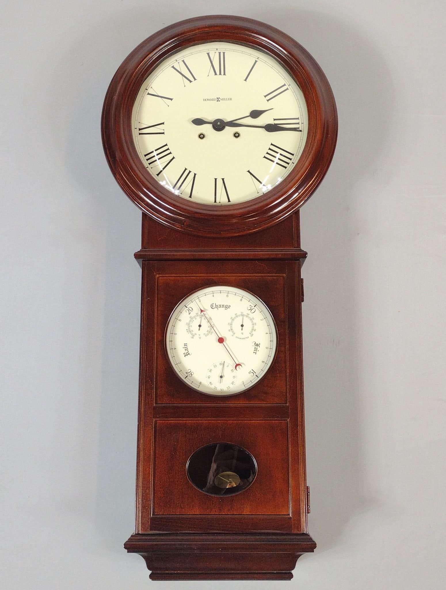 Howard Miller Wall Clock: NOT ELIGIBLE FOR IN-HOUSE SHIPPING. Working. Model 620-249. 15-1/2" wide X 5-1/2" deep X 35-1/2" high.