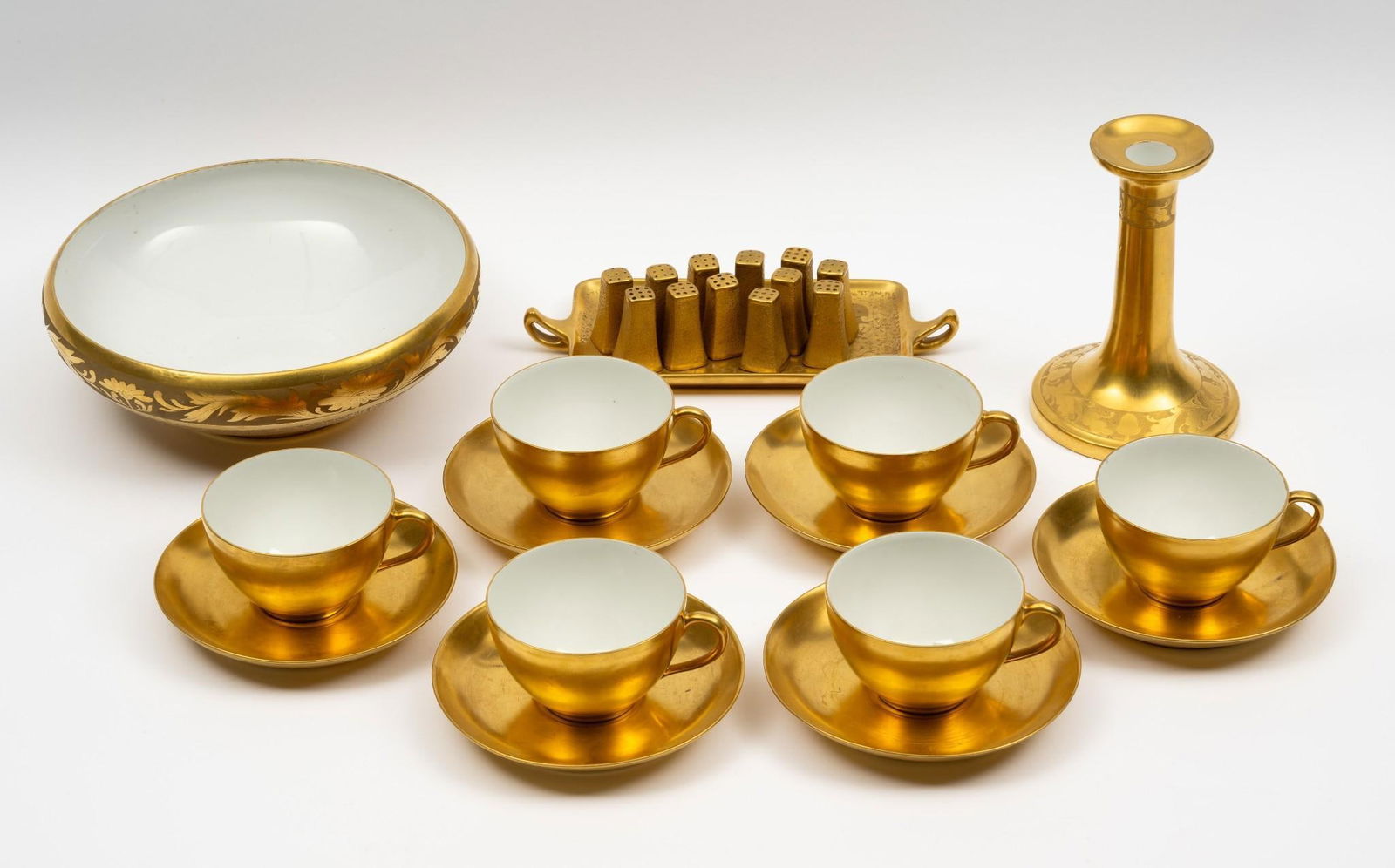 Gold Painted Ceramics: Includes Omar Guild Studios bowl and salt set, set of 6 Haviland cups and saucers, and unmarked candlestick. Bowl 8-1/2" wide.