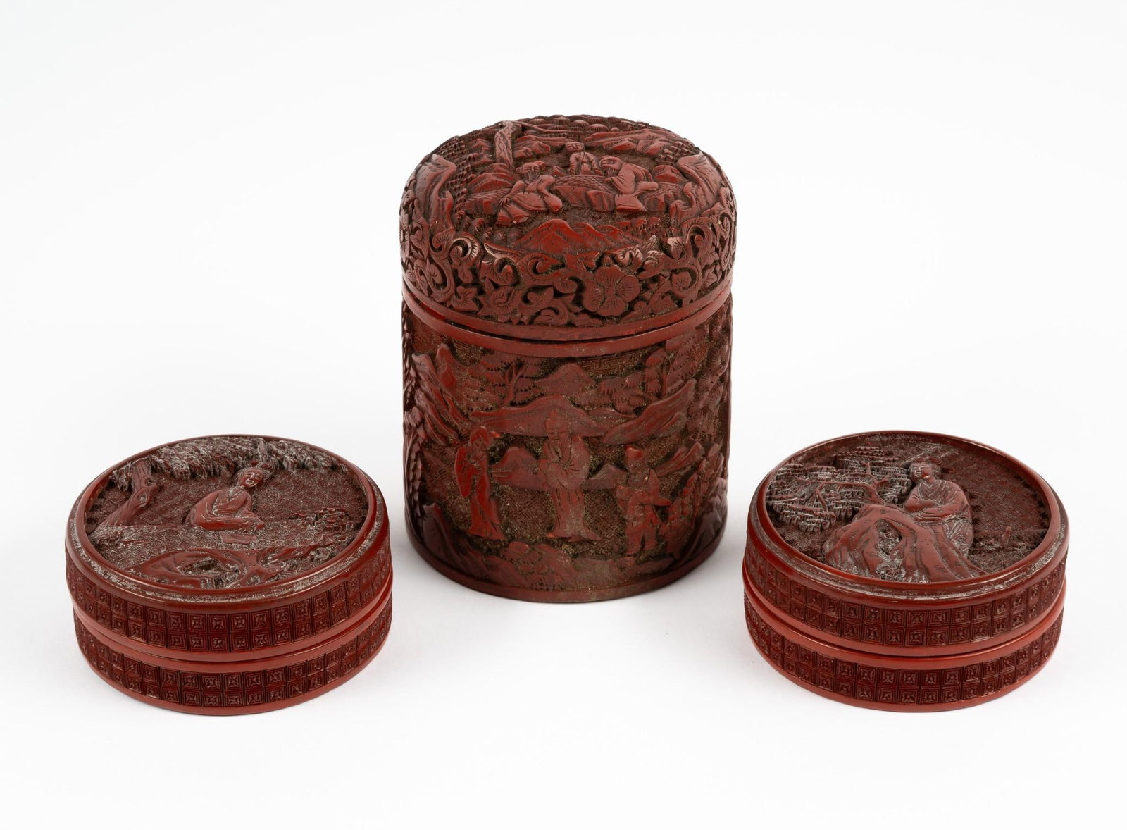 3 Cinnabar Boxes: 3" diameter x 1-1/4" to 4" high. Minor wear to finish.