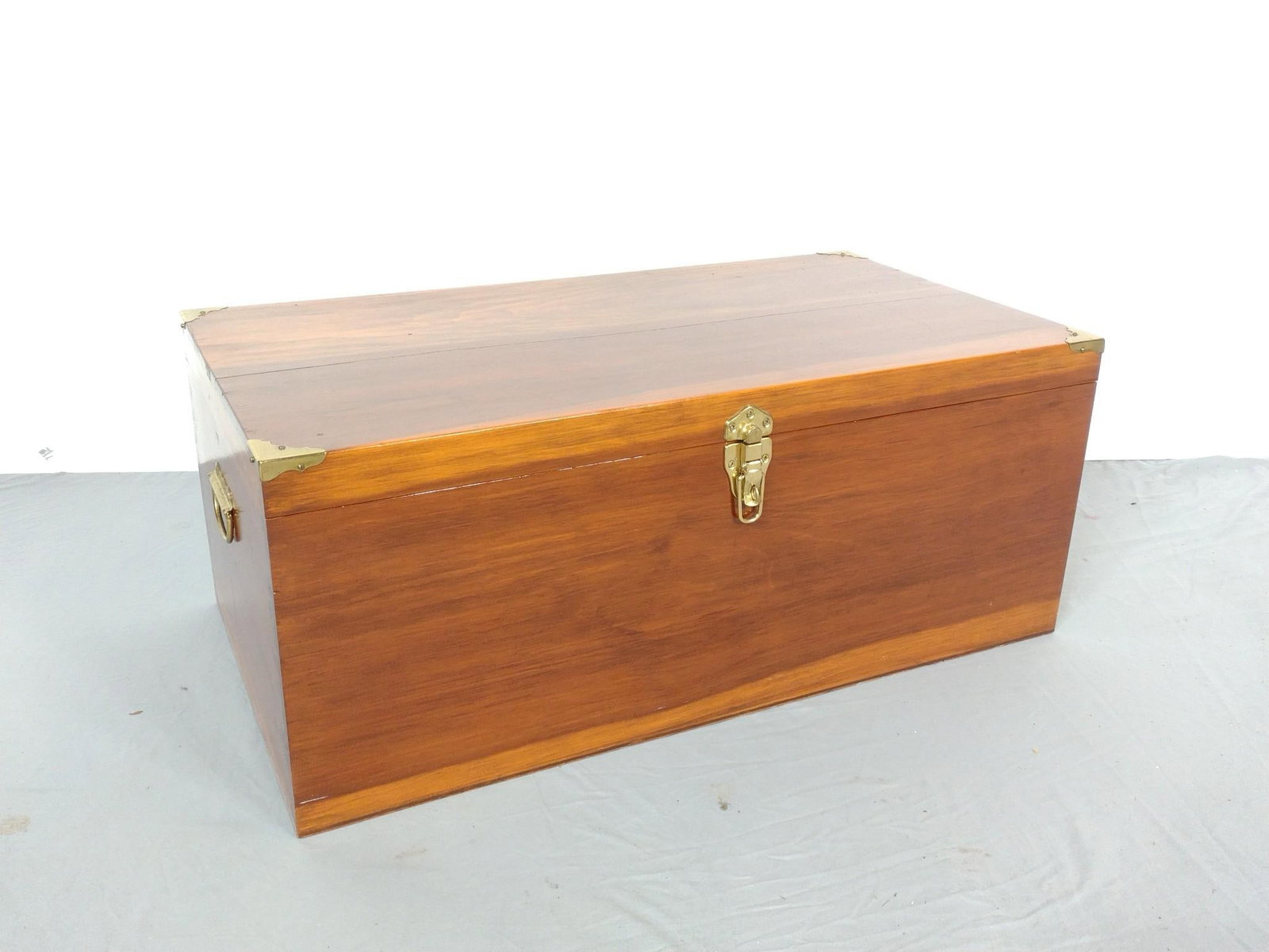 Storage Chest with Brass Mounts: NOT ELIGIBLE FOR IN-HOUSE SHIPPING. 30" wide X 16" deep X 12-1/4" high. Has some light scratches.