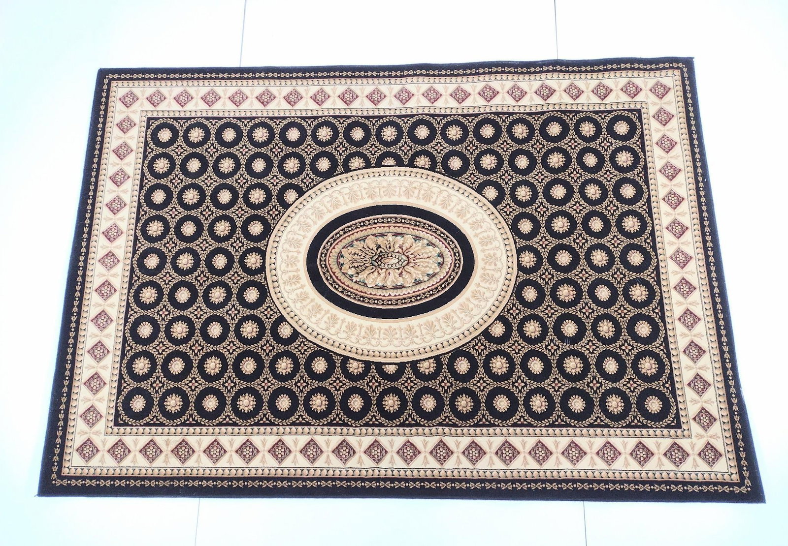 Regency Area Rug: NOT ELIGIBLE FOR IN-HOUSE SHIPPING. 7'6" long X 5'3" wide.