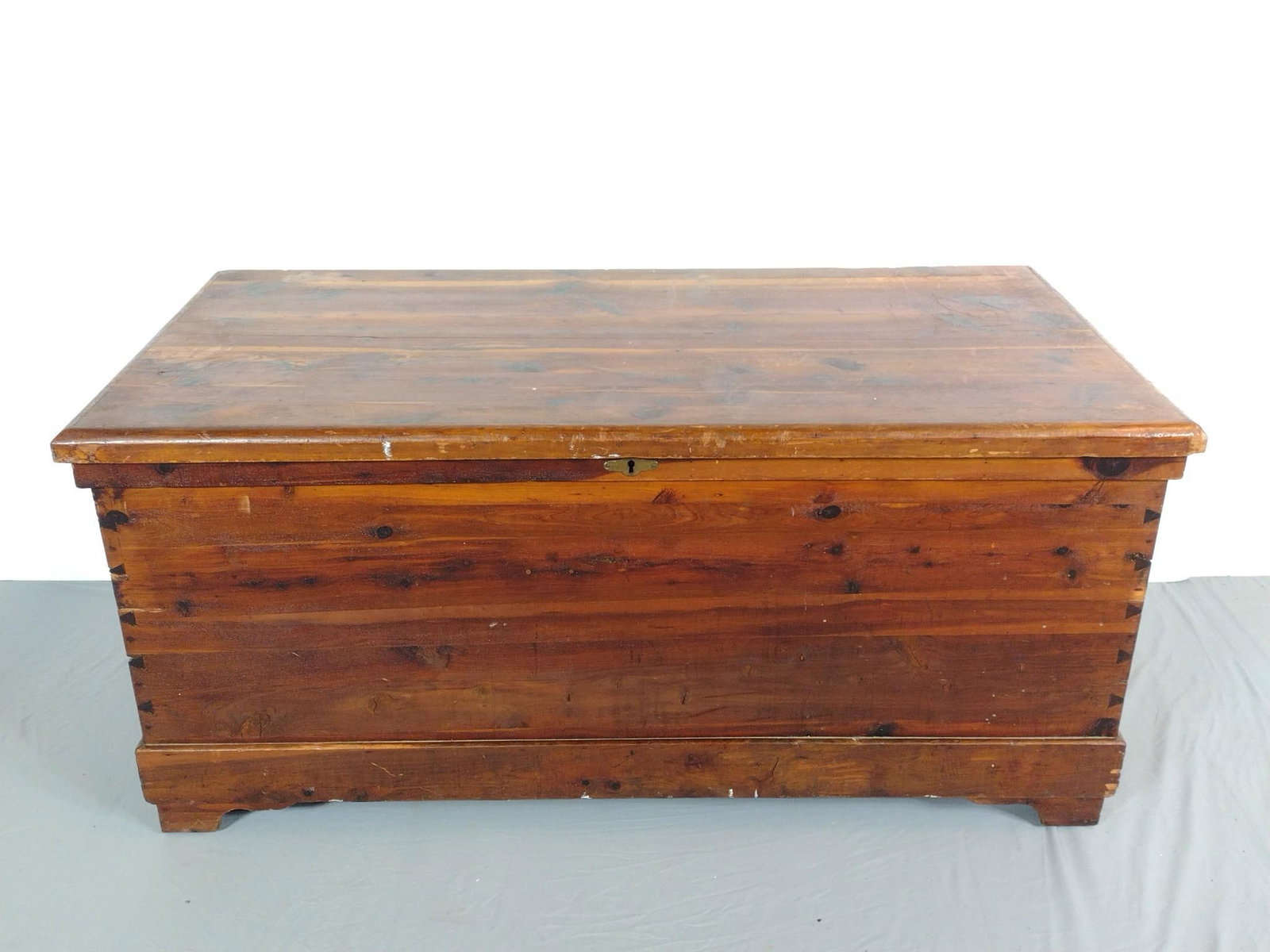 Cedar Chest: NOT ELIGIBLE FOR IN-HOUSE SHIPPING. 48-1/2" wide X 24" deep X 22-3/4" high. Has some scratches and areas of finish loss.