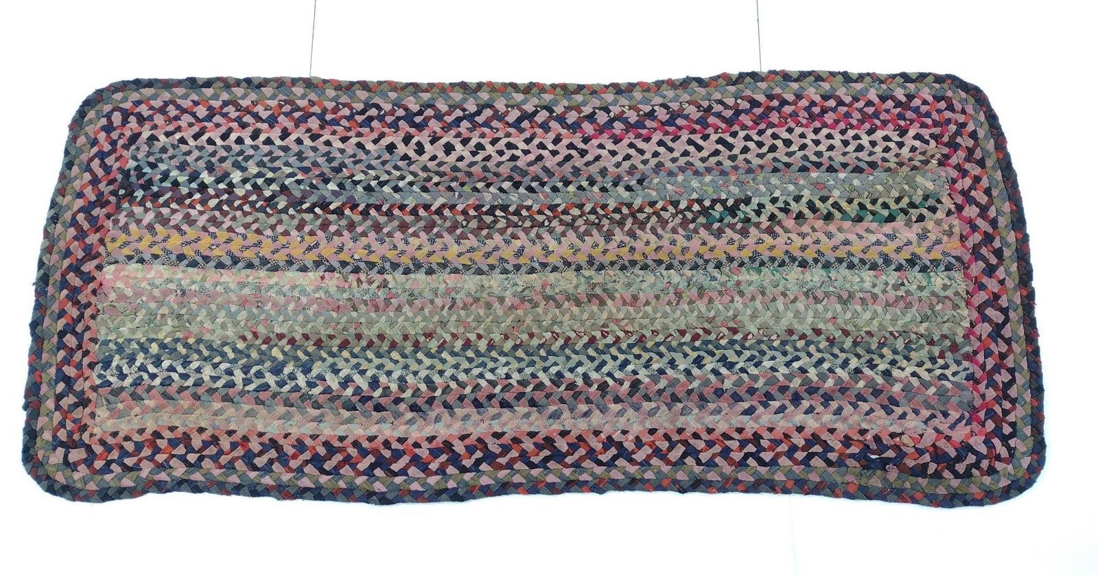 Braided Rug: NOT ELIGIBLE FOR IN-HOUSE SHIPPING. 8' long X 3'10" wide. Has some wear.