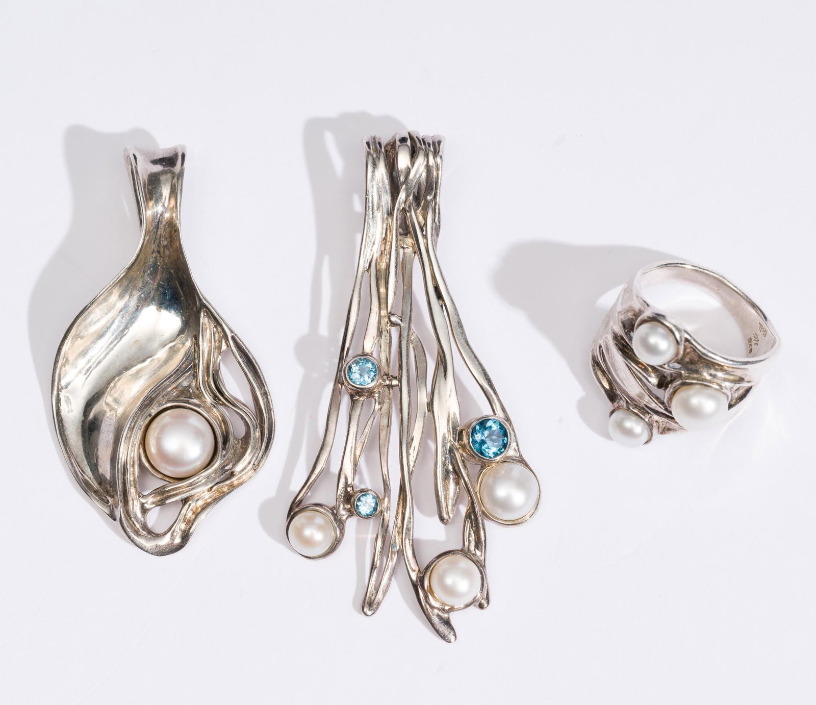 Sterling Silver Ring and 2 Pendants: All similarly themed pieces with cultured mabe pearls that can go together, from Hagit Gorali jewelry manufacturer, Israel. Ring size 8.5 and pendants 2" and 2 1/2". Total weight of 0.9 troy ounces.