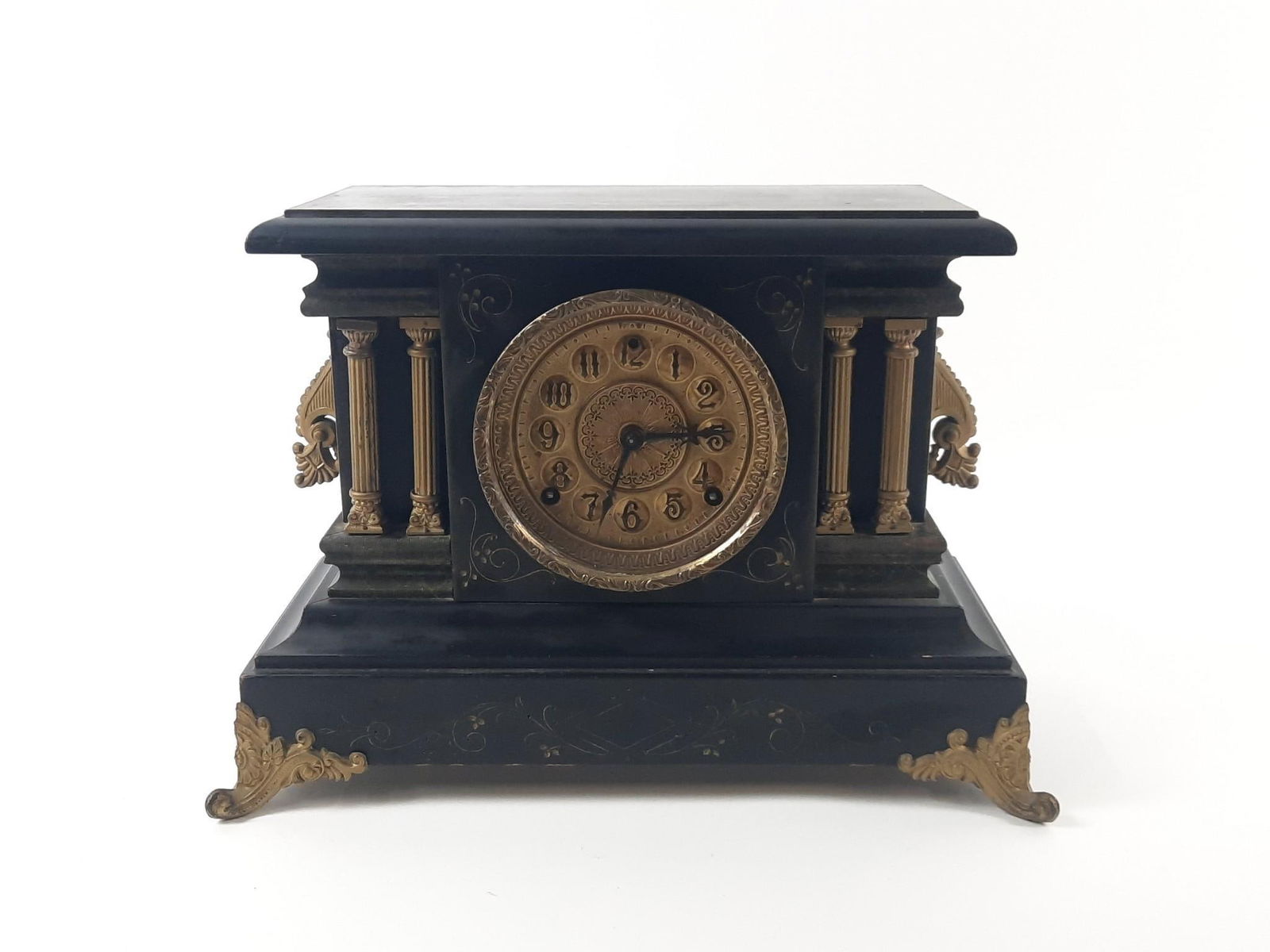 E. N. Welch Mfg. Co. Victorian Mantle Clock: Chimes, but hands do not move. 15" wide x 7-1/2" deep x 11-1/4" high. Some finish losses around edges. PROVENANCE: Sale of this item to benefit Historic Harrisburg Association.