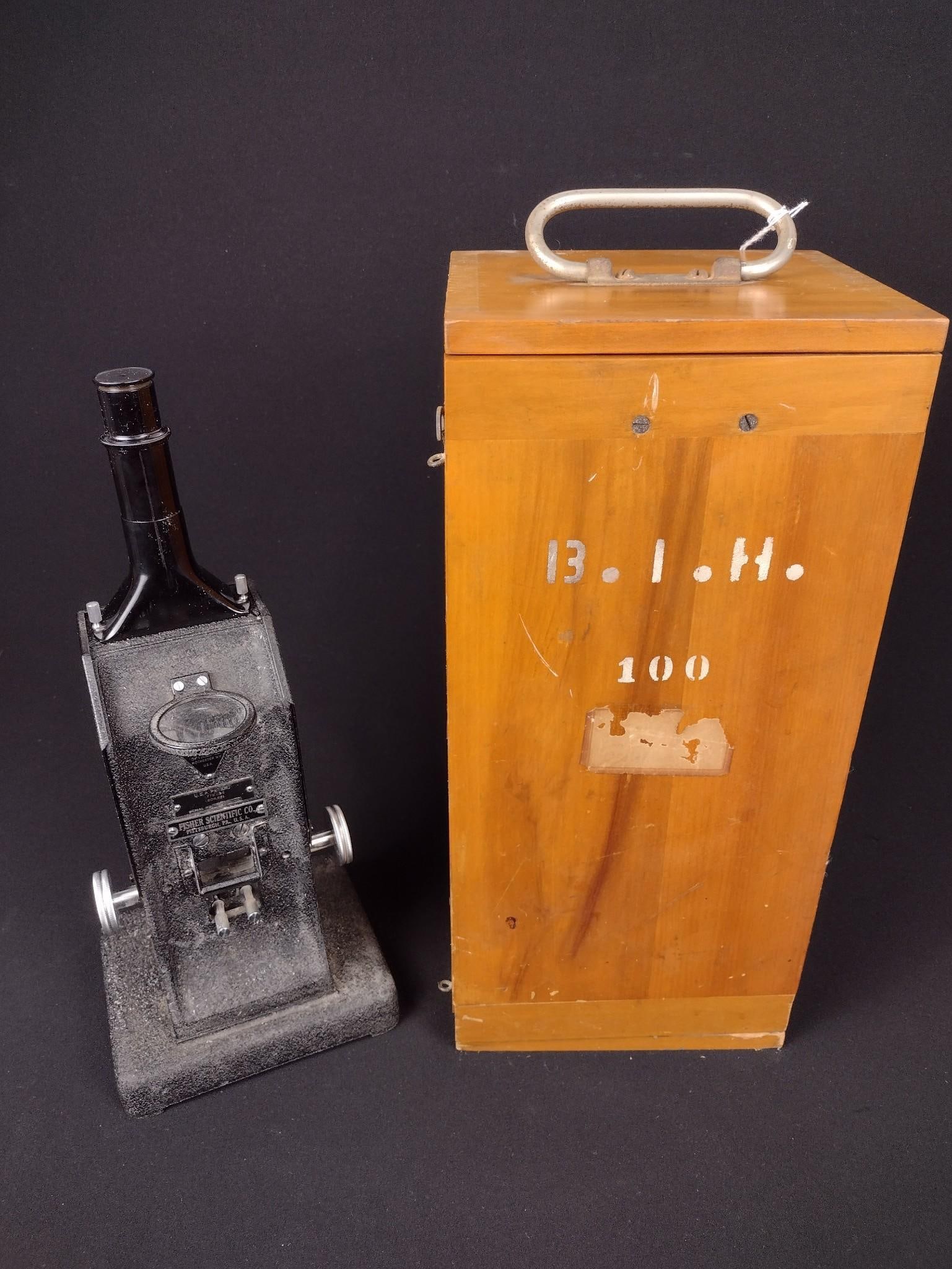 Bosch and Lomb Microscope in Wood Case: Fisher Scientific Co. Case: 8" wide x 6-1/2" deep x 18" high. Case with some wear consistent with age and use.