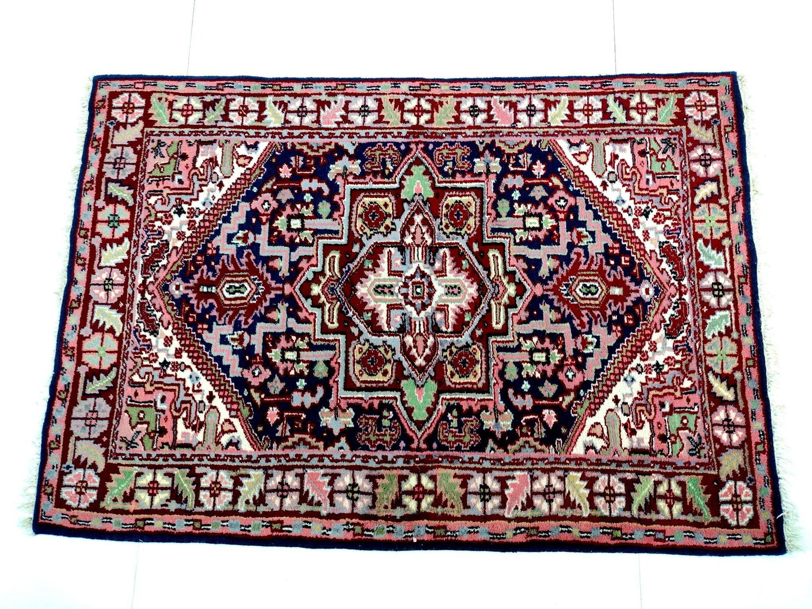 Heriz Style Area Rug: NOT ELIGIBLE FOR IN-HOUSE SHIPPING. 6' long X 4'2" wide. No manufactures name found. PROVENANCE: Sale of this item to benefit Historic Harrisburg Association.