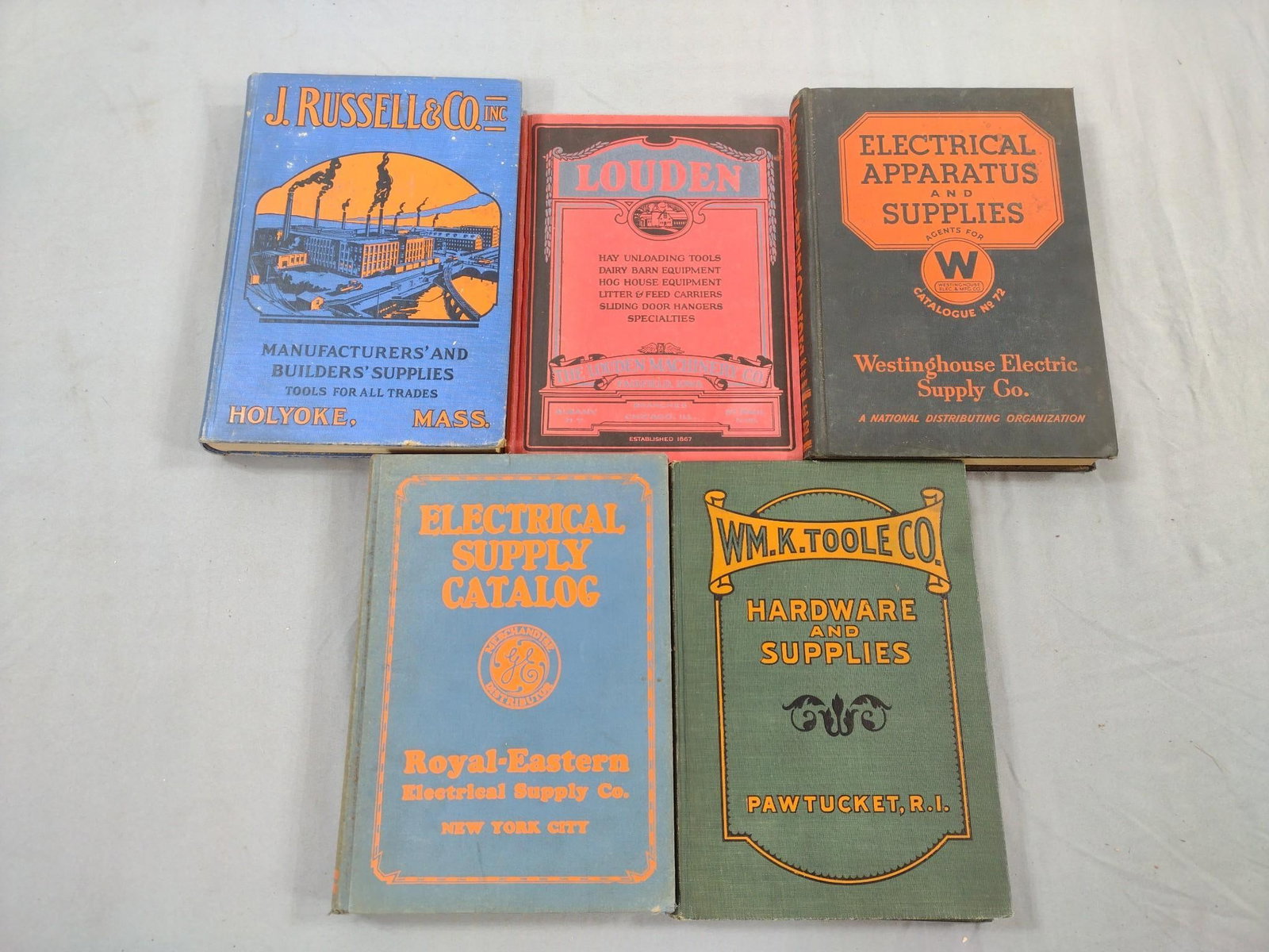 5 Antique Tool and Supply Catalogs: Includes Westinghouse Electric Supply, Louden Barn Equipment, Toole, Royal-Eastern, and J. Russell and Co. All with some wear consistent with age and use.
