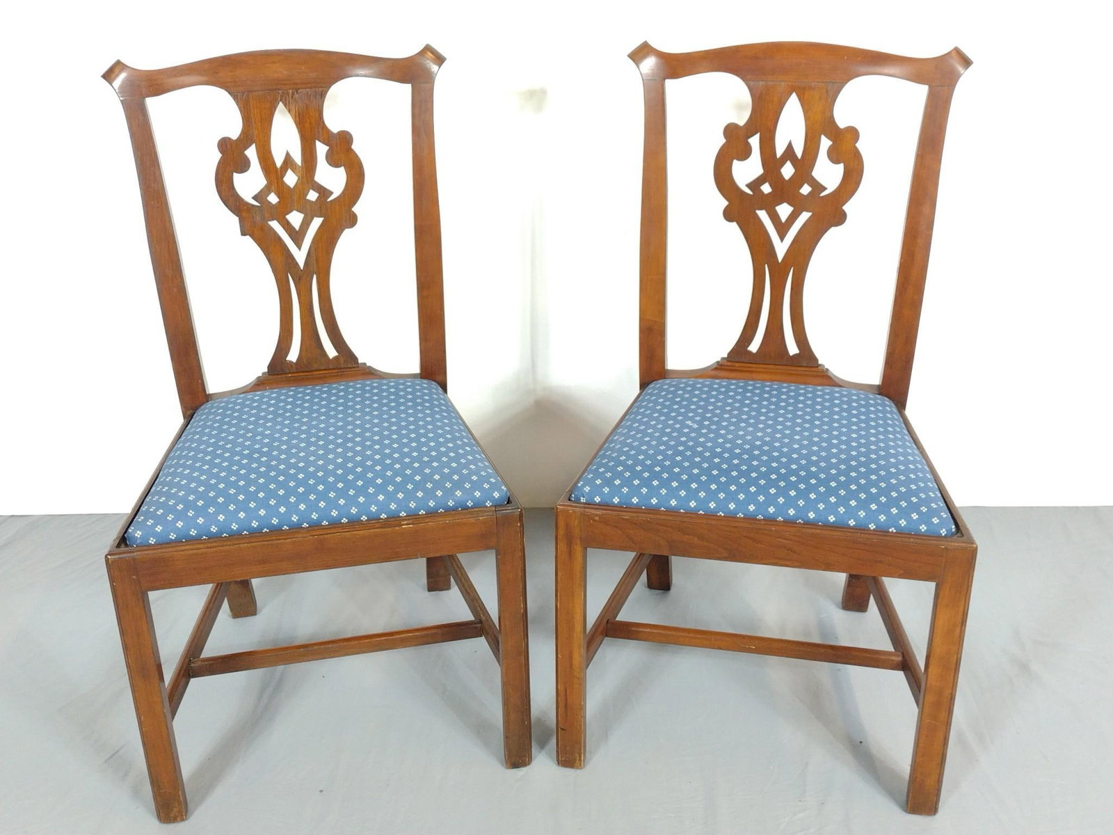 Pair Of Carved Back Side Chairs: NOT ELIGIBLE FOR IN-HOUSE SHIPPING. Each 22" wide X 17-1/2" deep X 36" high. Both have some light scratches. PROVENANCE: Sale of this item to benefit Historic Harrisburg Association.