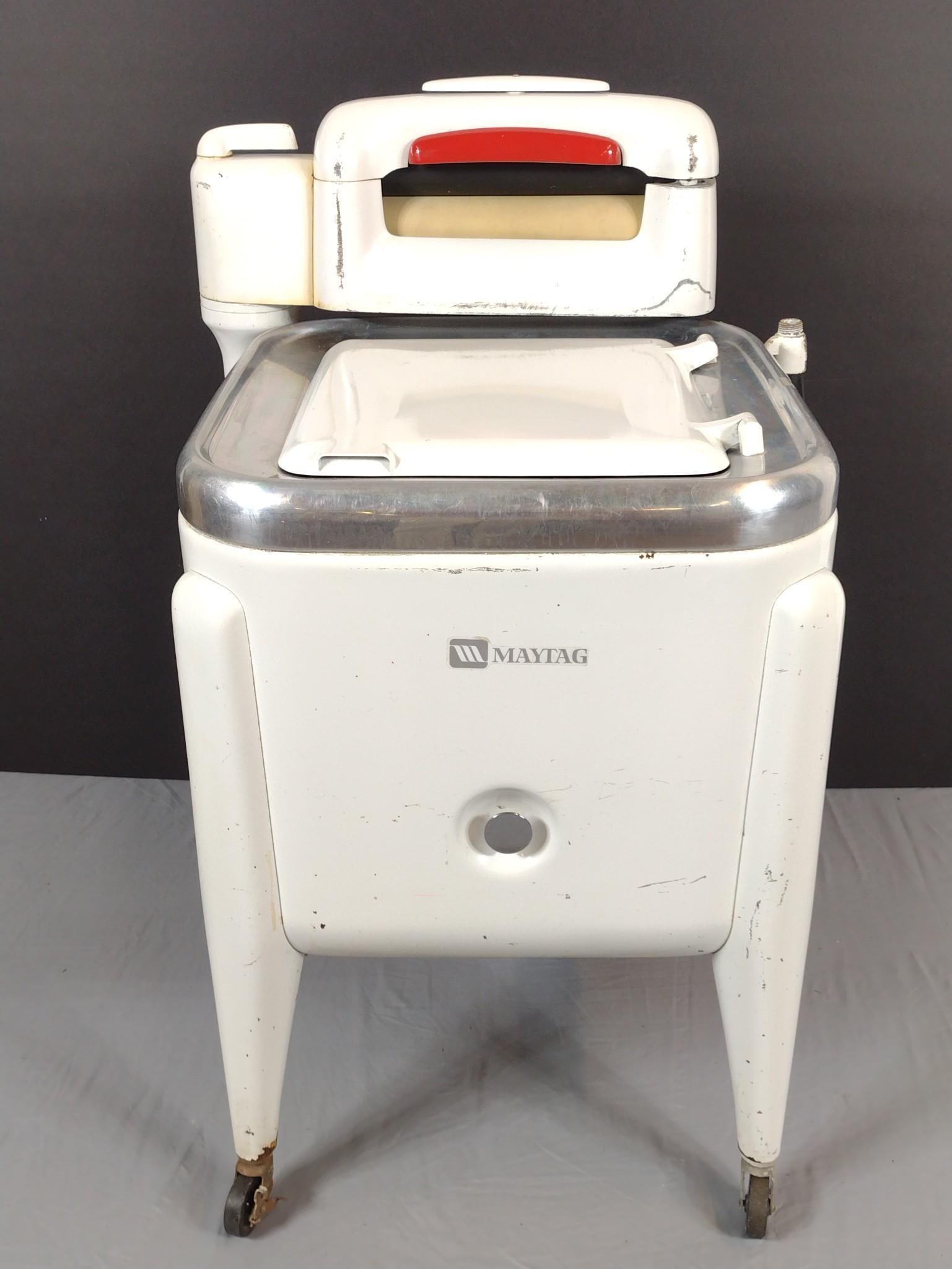 Maytag Model E2LS Gyratator Washer: NOT ELIGIBLE FOR IN-HOUSE SHIPPING. 27" wide X 26" deep X 41" high. Has some paint loss and areas of discoloring.