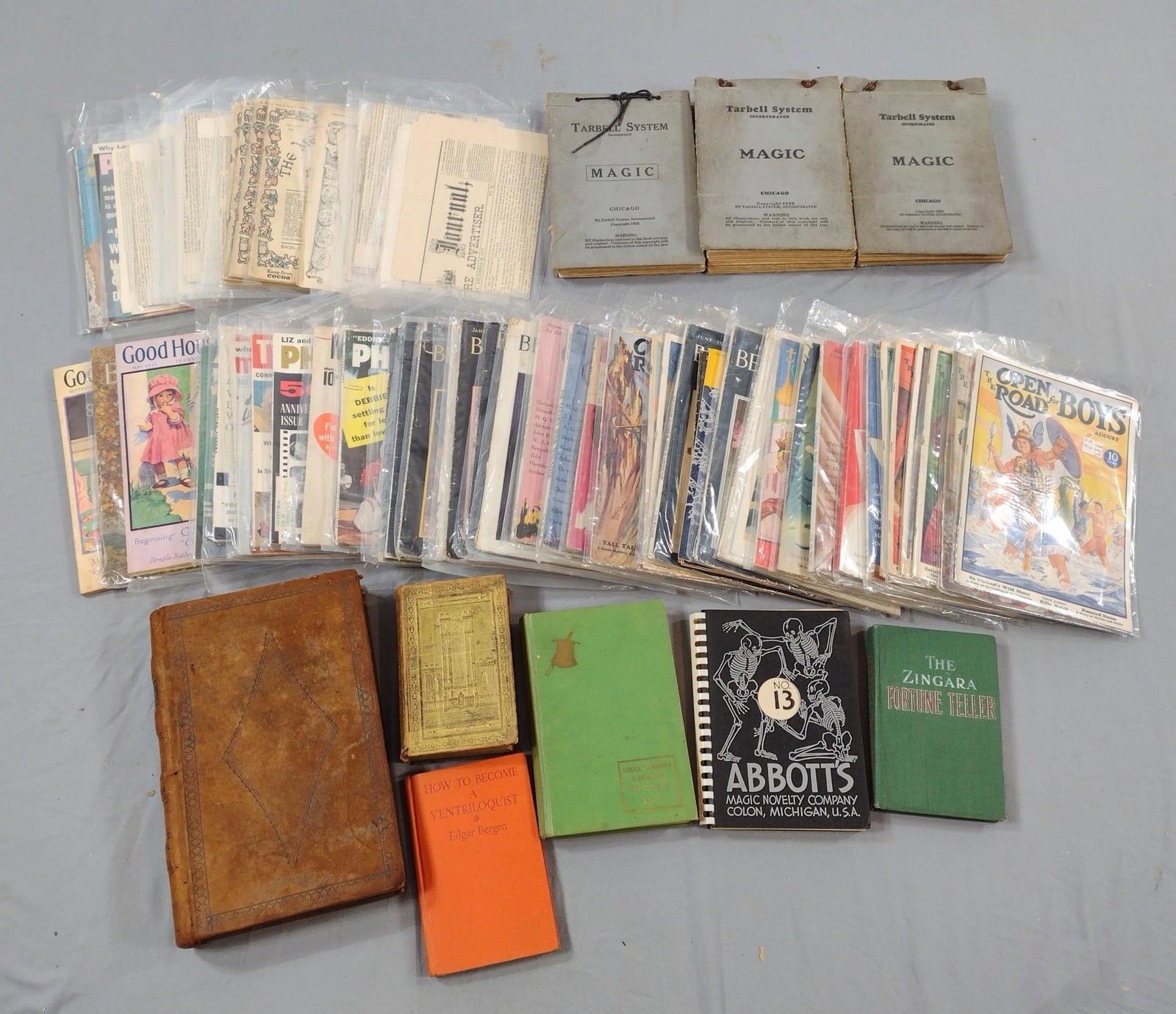 Large Grouping Books and Ephemera incl Magic: Also includes How to Become a Ventriloquist, newspapers, ledgers, and more. Some with wear consistent with age and use.