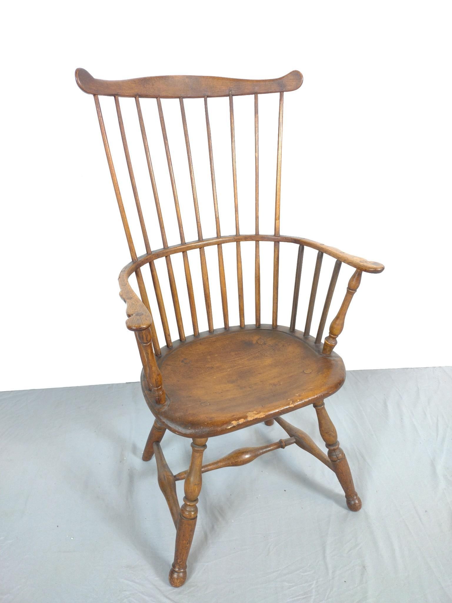 Comb-Back Windsor Chair: NOT ELIGIBLE FOR IN-HOUSE SHIPPING. 23" wide X 16" deep X 42" high. Has some wear. Back rest starting to split.