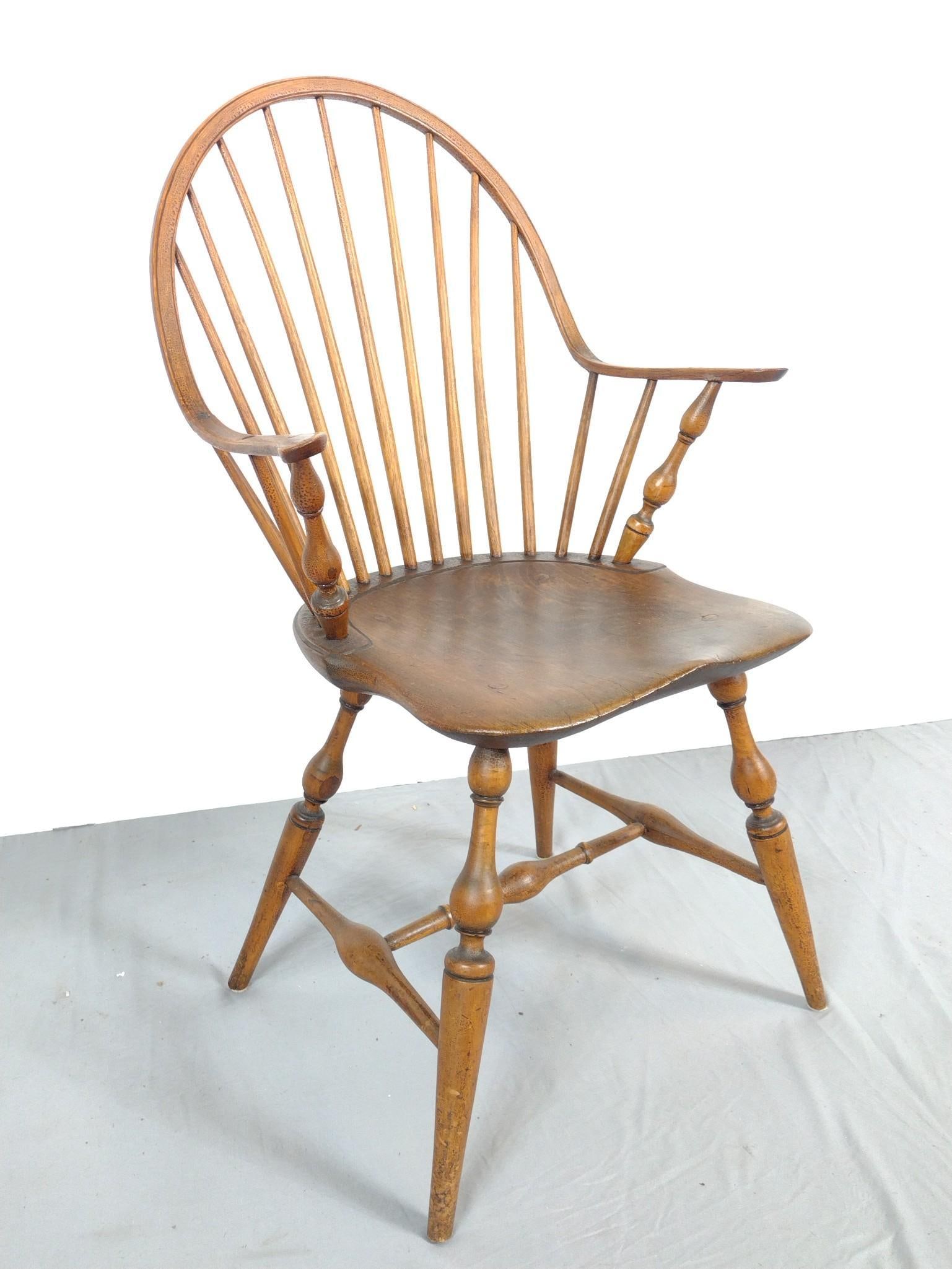 Windsor Arm Chair: NOT ELIGIBLE FOR IN-HOUSE SHIPPING. 22" wide X 17" deep X 36-1/2" high. Has some wear. One armrest spoke is broken.