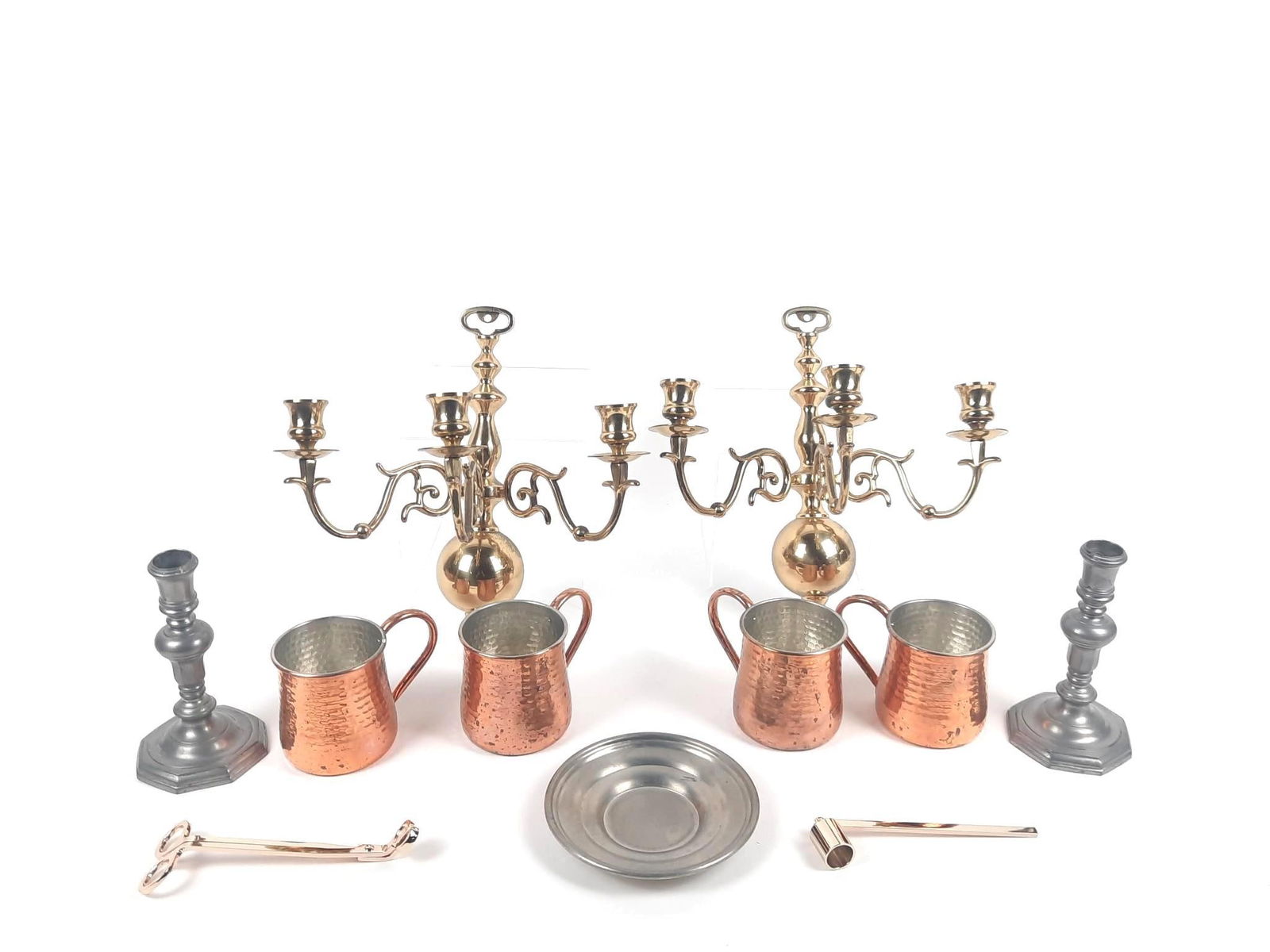 11 Pcs Metalware incl Candlesticks: Also includes cups, plates, and more. Candlesticks measure 3-3/4" wide x 7" high. Cups measure 3-1/2" wide x 3-1/2" high.