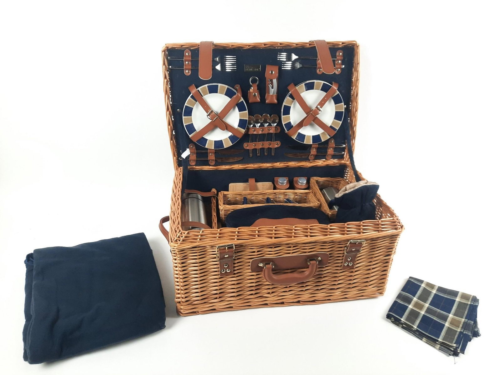 Picnic Time Wicker Picnic Basket w/ Accessories: NOT ELIGIBLE FOR IN-HOUSE SHIPPING. Includes service for 4; 4 napkins; blanket; oven mitt; corkscrew; wine stopper; thermos; salt and pepper shaker; cutting board; containers; and lunch bag. 24" wide 