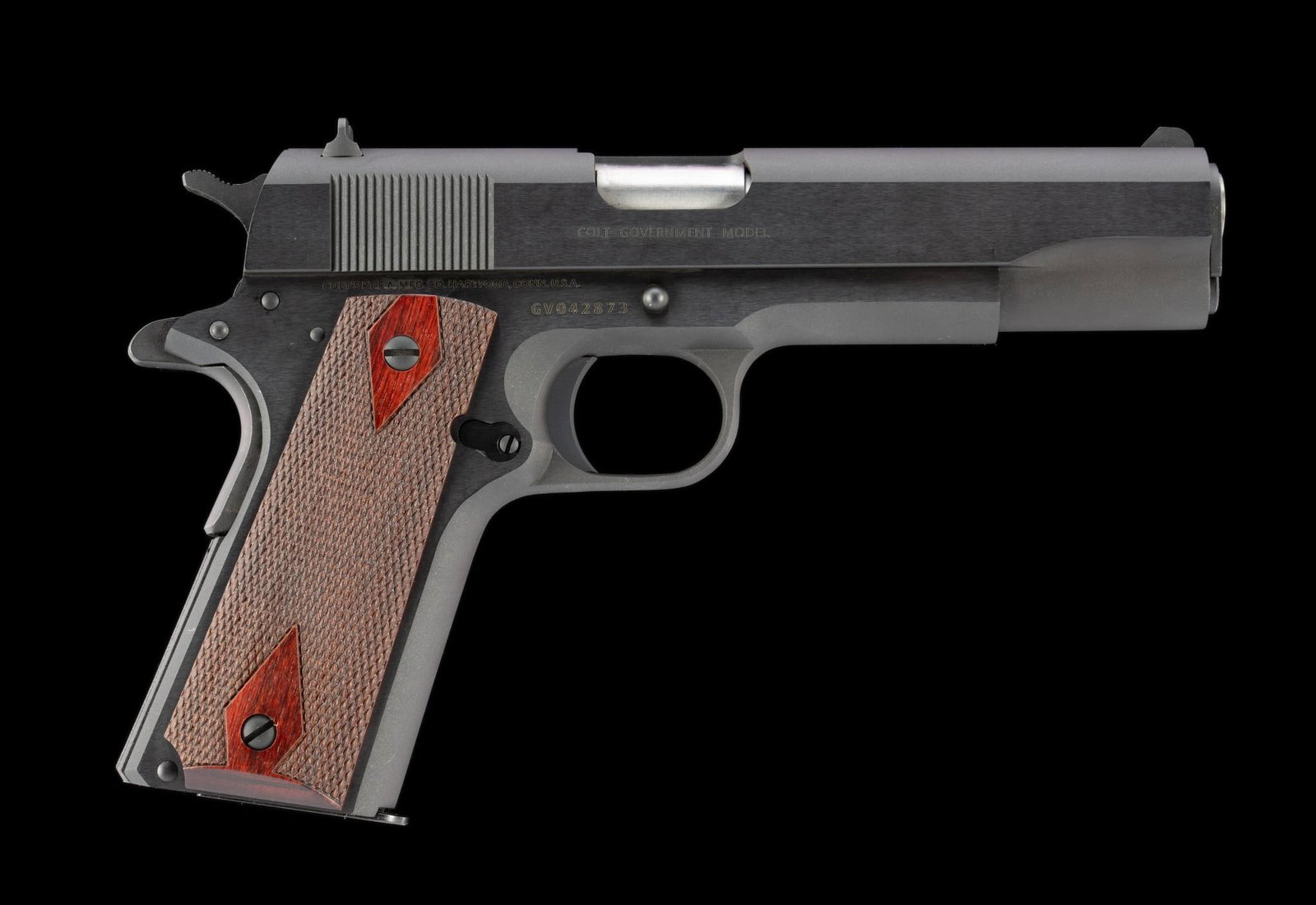 Colt Gov't. Model (1911C) MkIV, Series 70 Semi Auto Pistol, Caliber .45ACP: Serial Number: GV042873 Design: This Colt Government Model MkIV Series 70 is a standard Model O (1911C) .45ACP semi automatic pistol with the following features. 1911A1 grip safety, short trigger and 