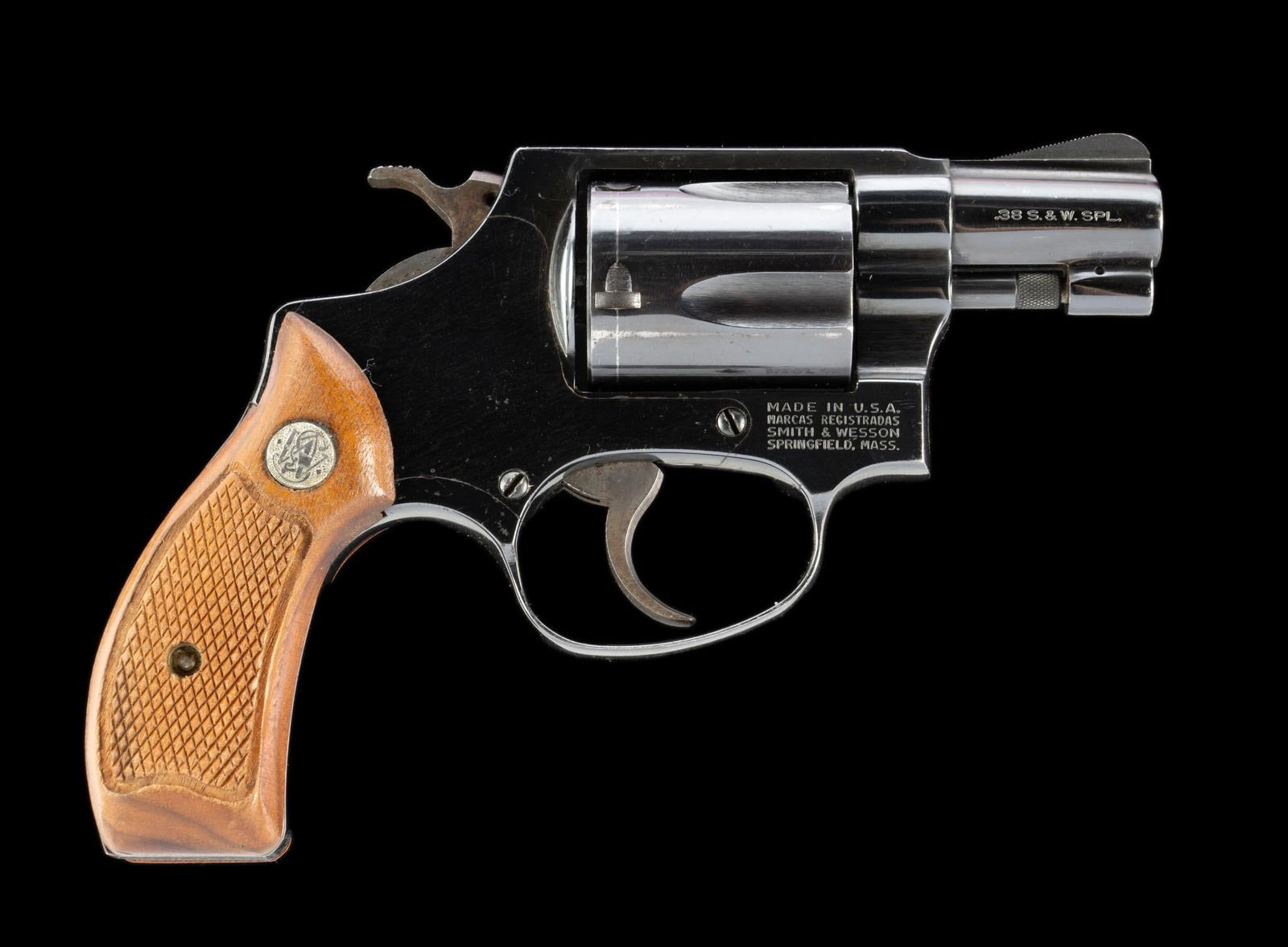 S&W Model 36 Chief's Special Revolver, Caliber .38 Special: Serial Number: AAR6400 Design: This is a standard Smith & Wesson snub nose Model 36 revolver, often referred to as the Chief's Special. 2" barrel, 5-shot cylinder, blued steel construction with rounde