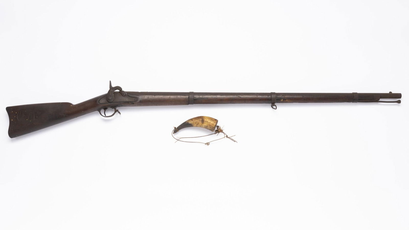 U.S. Springfield M1861 Rifle Musket, Relic Condition, Caliber .58: Serial Number: NSN Design: This Model 1861 rifle musket has a 40" barrel in caliber .58; designed for Minie balls. The piece functions and the action is solid both at 1/2 and full cock. The piece is r