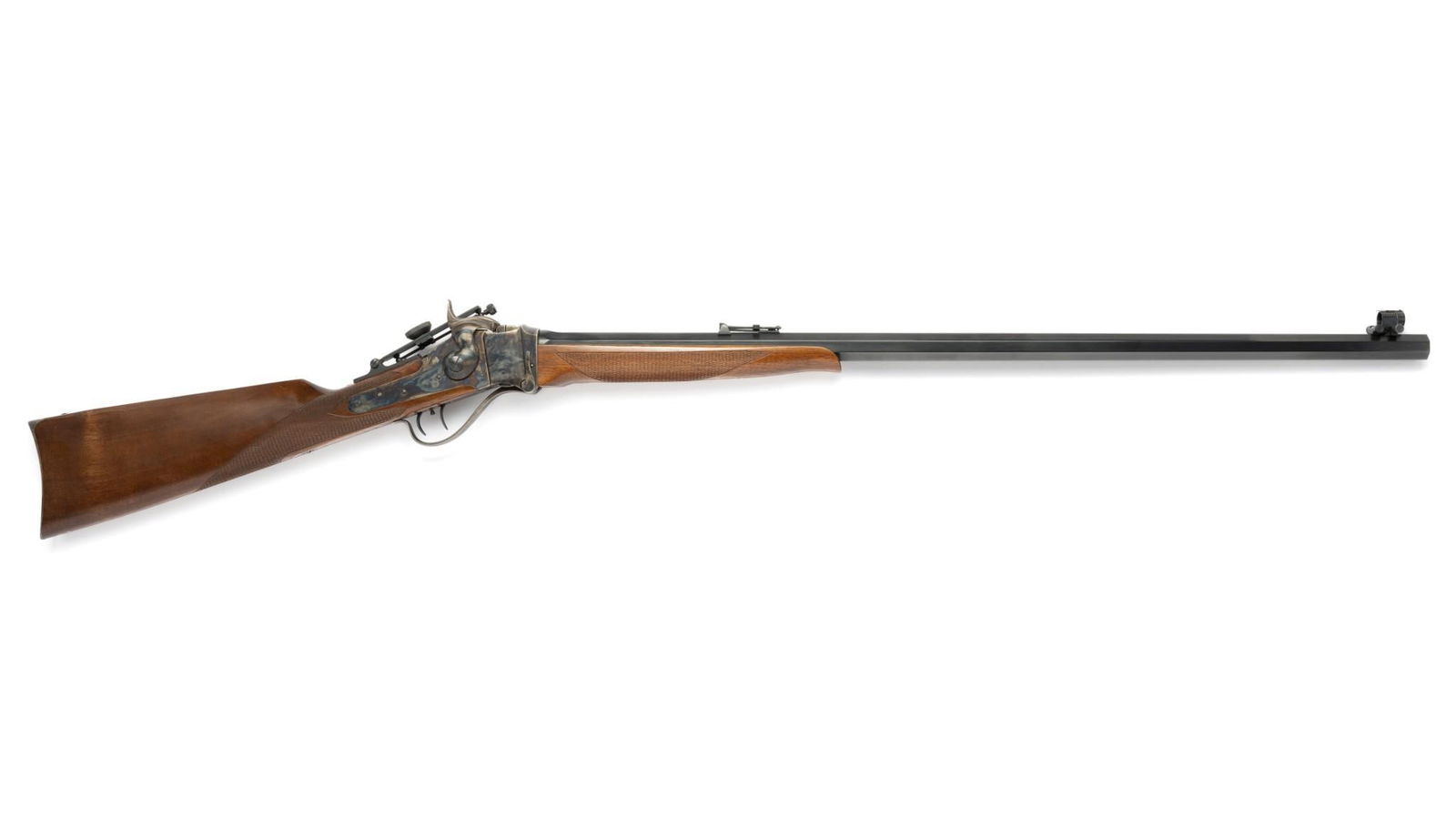 Pedersoli Reproduction of Sharps 1874 Rifle, Caliber .45-70: Serial Number: SH9845 Design: This rifle is a 20th century reproduction of the Sharps 1874 rifle. Caliber .45-70. 32" full octagonal, blued heavy barrel. Protected front sight; leaf rear adjustable fo