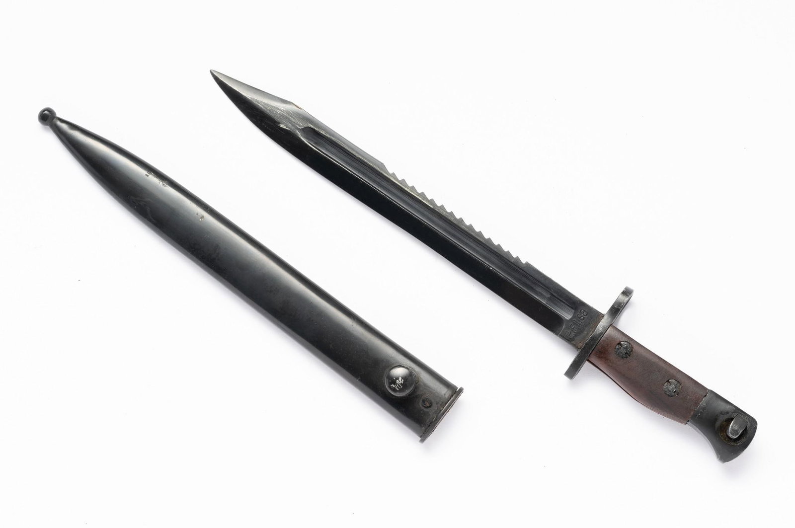 British WWII RFI Bayonet: Marked RFI 68 on blade. With scabbard. Overall 14-3/4" long.