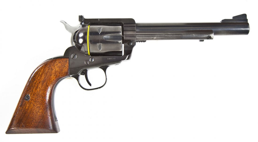 Ruger Blackhawk FlatTop Revolver - .357 Mag: SERIAL #: 34679 (1 of 2,500) DESIGN: Double action with removable 6-shot cylinder. 6-1/2” barrel. MATERIAL/FINISH COMPOSITION: Blued steel. Varnished walnut grip panels. FEATURES: Blade front sight.
