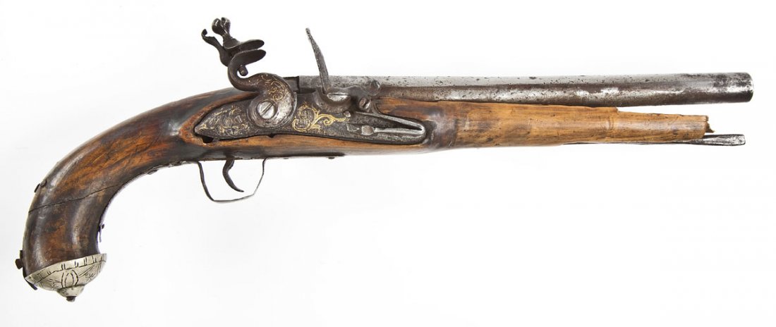 Unmarked Turkish Style Flintlock Pistol - .60 Cal.: SERIAL #: None DESIGN: Single shot flintlock. 10-1/2” barrel. MATERIAL/FINISH COMPOSITION: Unfinished barrel. Wood stock. FEATURES: No sights. Gold decorated lock plate. Engraved grip end cap. Metal