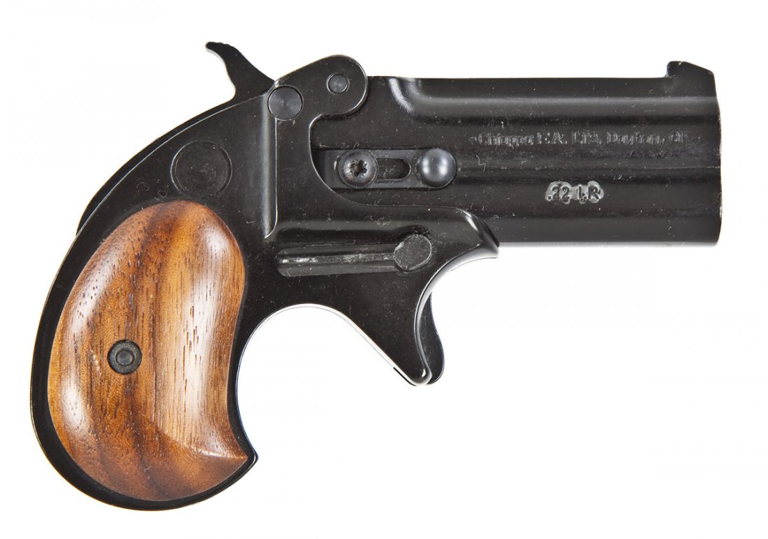 Chiappa Double Eagle Derringer - .22 Cal.: SERIAL #: D06340 DESIGN: Break open over/under. 3” barrel. MATERIAL/FINISH COMPOSITION: Blued steel. Wood grip panels. FEATURES: Blade front sight. Groove rear sight. Comes with black leather hip ho