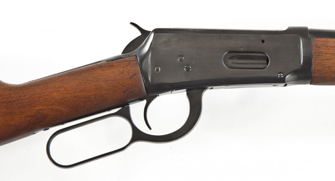 Winchester Model 94 Rifle - .32 Spl. Cal.: SERIAL #: 1455508 DATE OF MANF: 1943-1948 DESIGN: Lever action with tubular magazine. 20" barrel. MATERIAL/FINISH COMPOSITION: Blued steel. Wood straight stock and forearm. FEATURES: Hooded blade fron